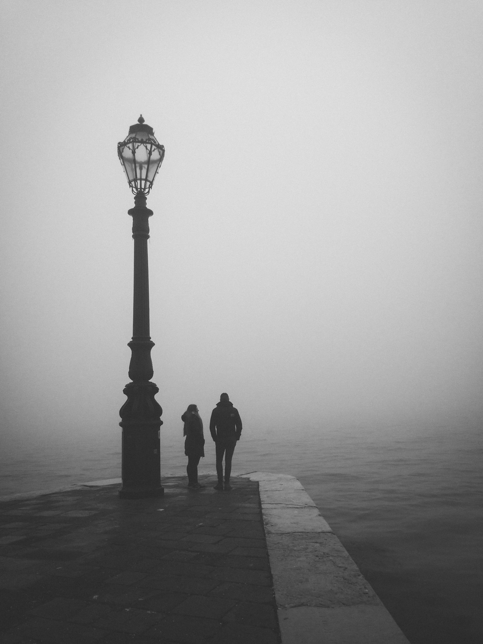 the first sunrise (and first fog) in venice. it might be hard to believe, but the sun is somewhere there, just above the horizon.