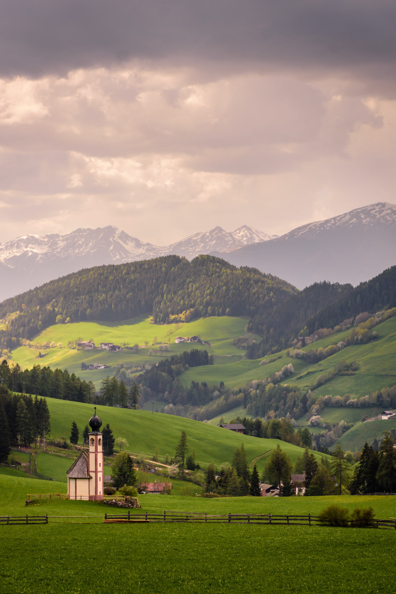 the small church of  san giovanni in ranui in the background of villnöß valley