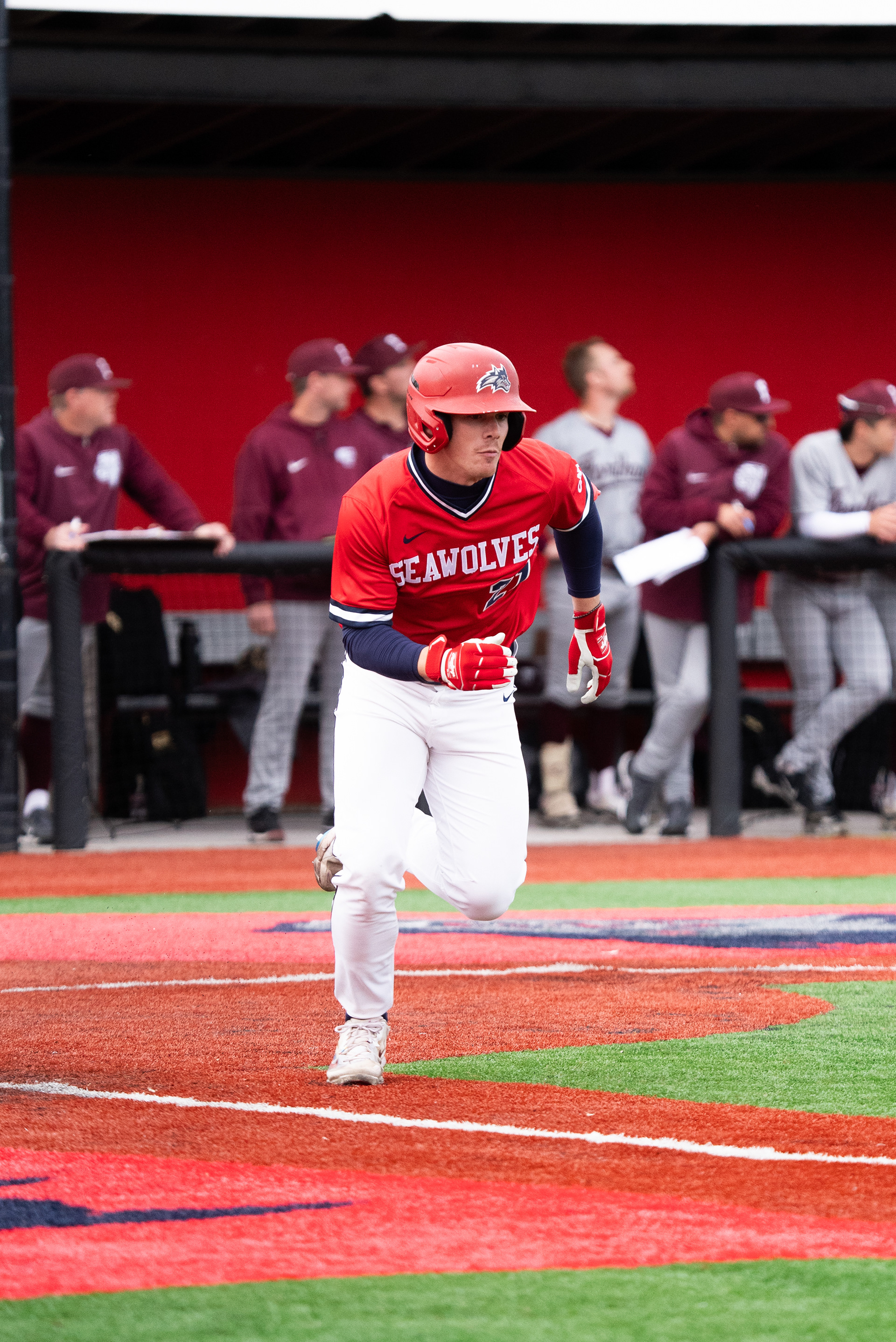 Matt Brown-Eiring sprinting down the first base line trying to beat out the throw - Stony Brook, NY 3/27/2024