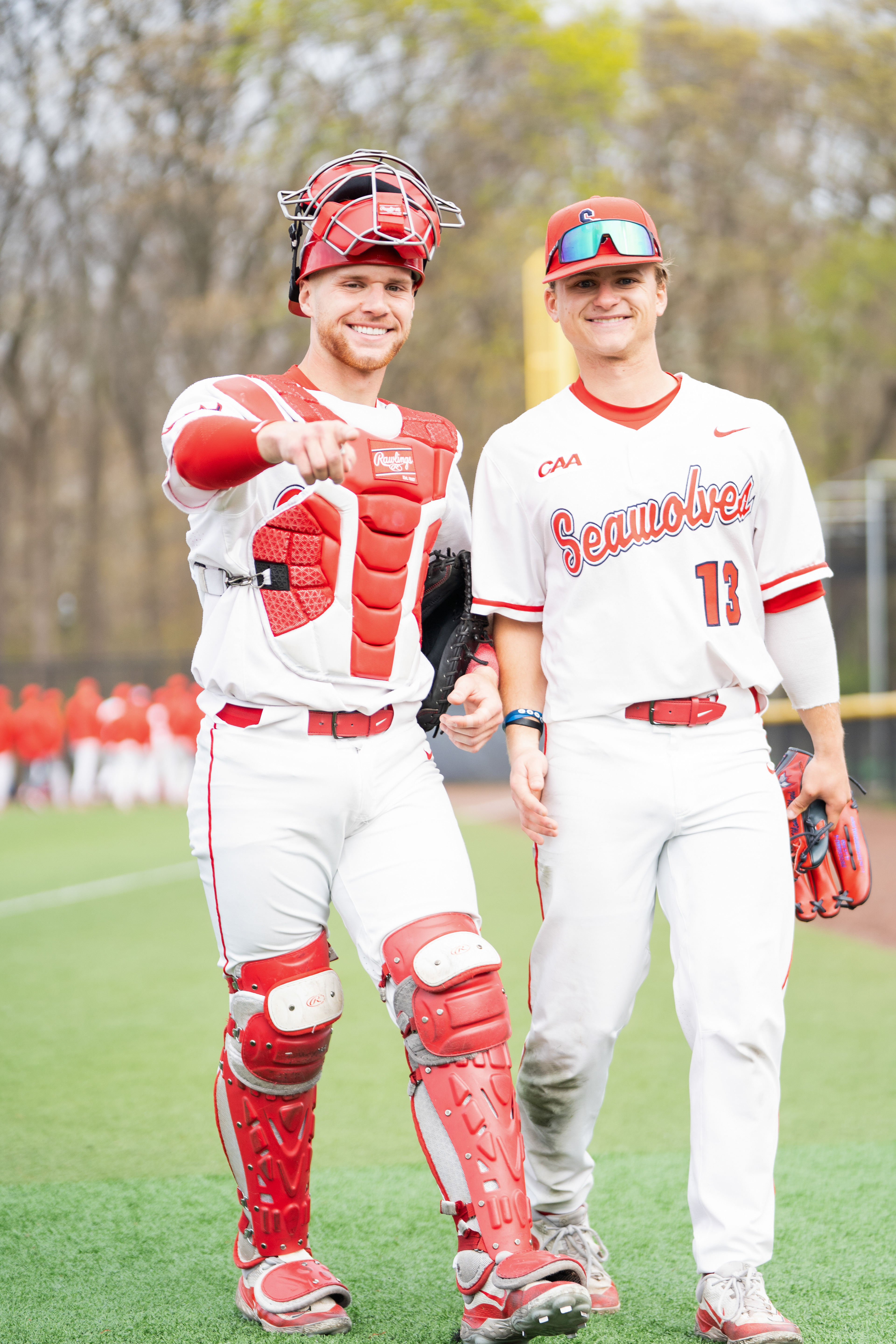 Ryan Micheli and Matt Wright flashing a pose to the camera with big smiles after a win - Stony Brook, NY 4/19/2024