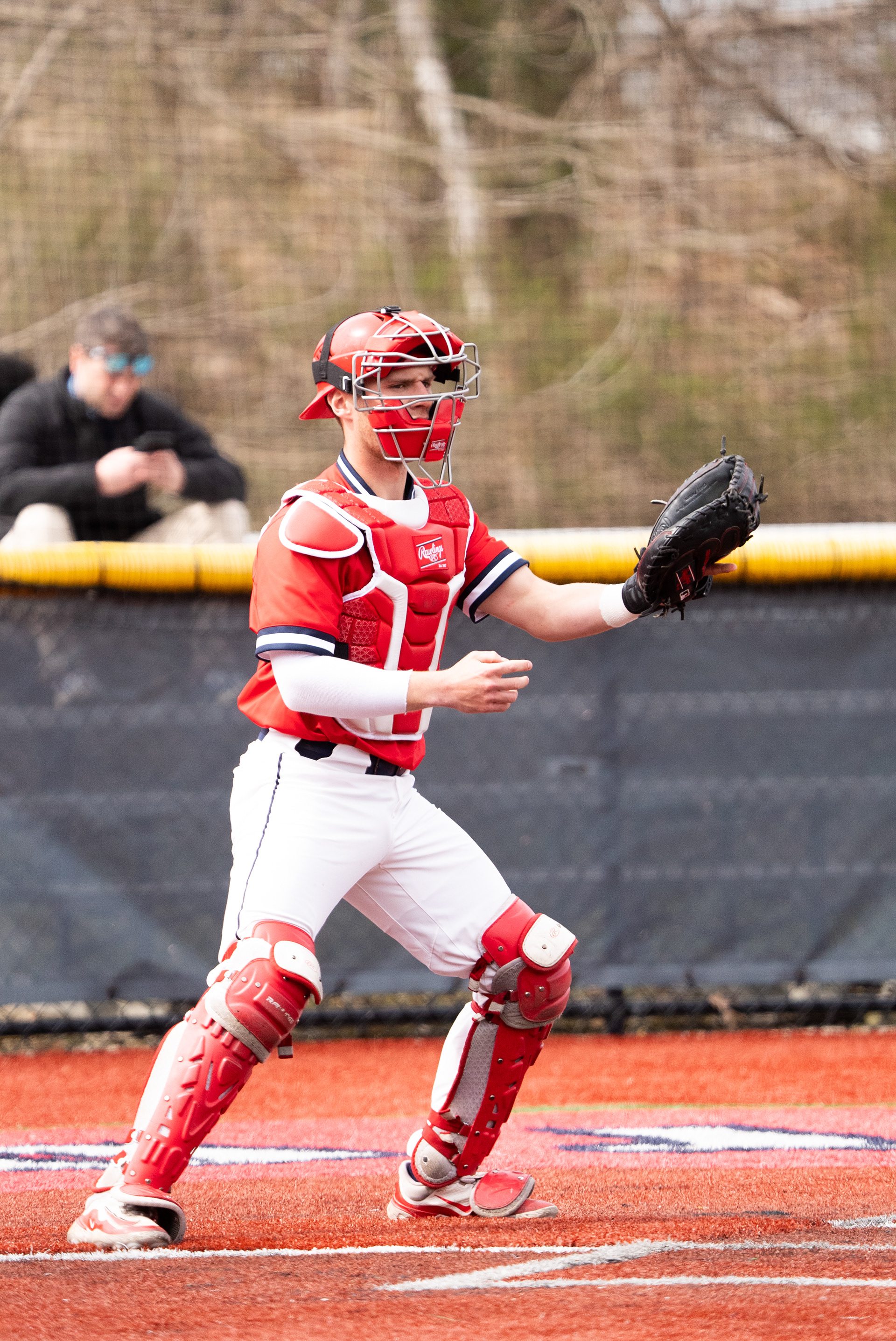 Ryan Micheli reaching for the ball in his glove on the throw down to second - Stony Brook, NY 3/27/2024