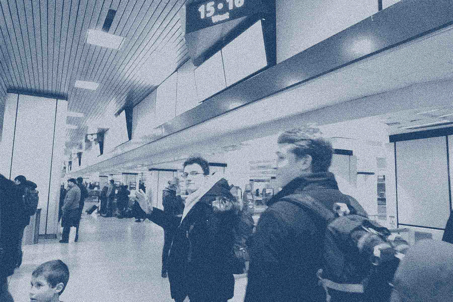A blue halftone print of two Chimes at Penn Station about to get on a train