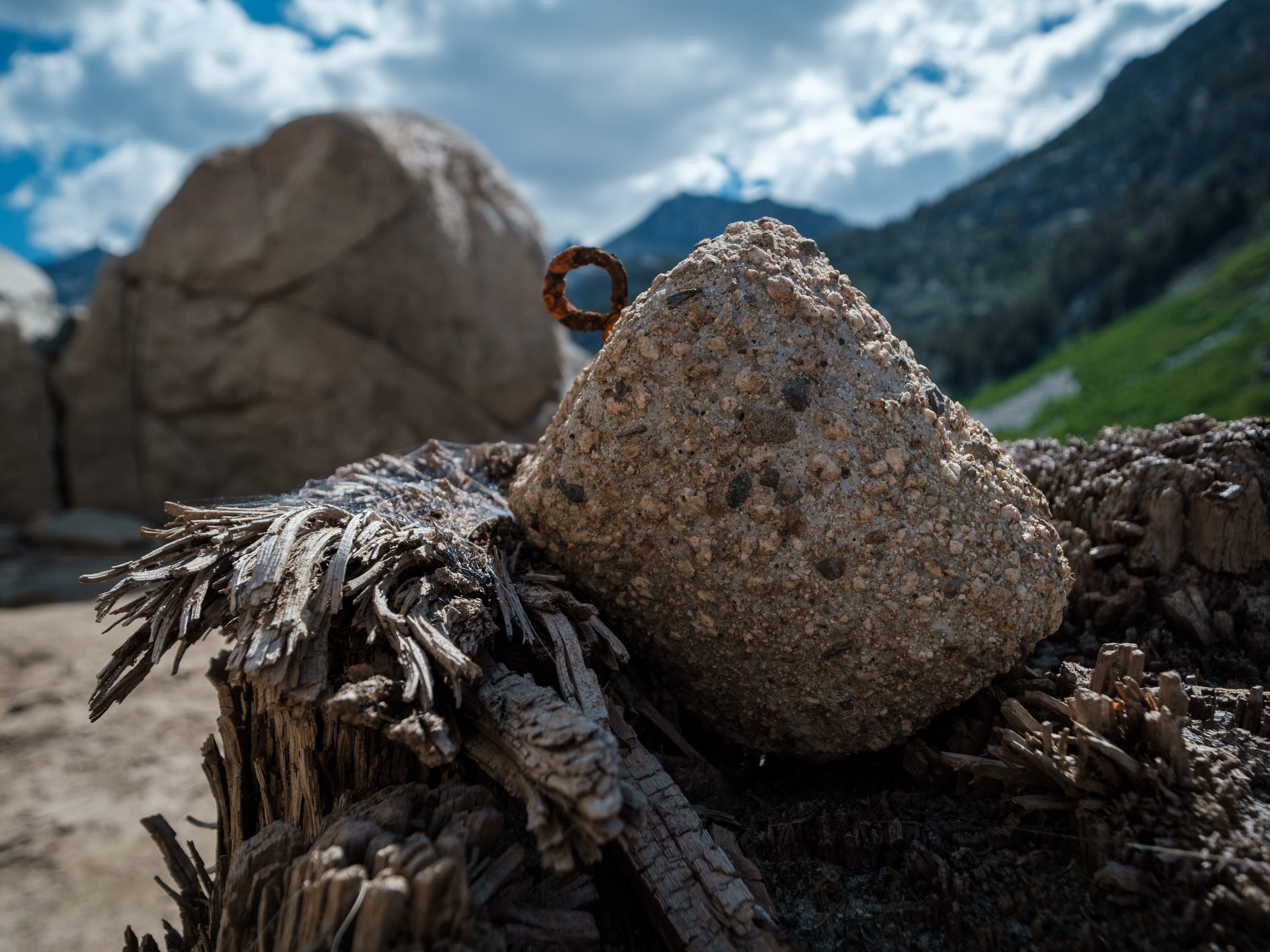Buoy weight on an old tree stump well below the full water line.
