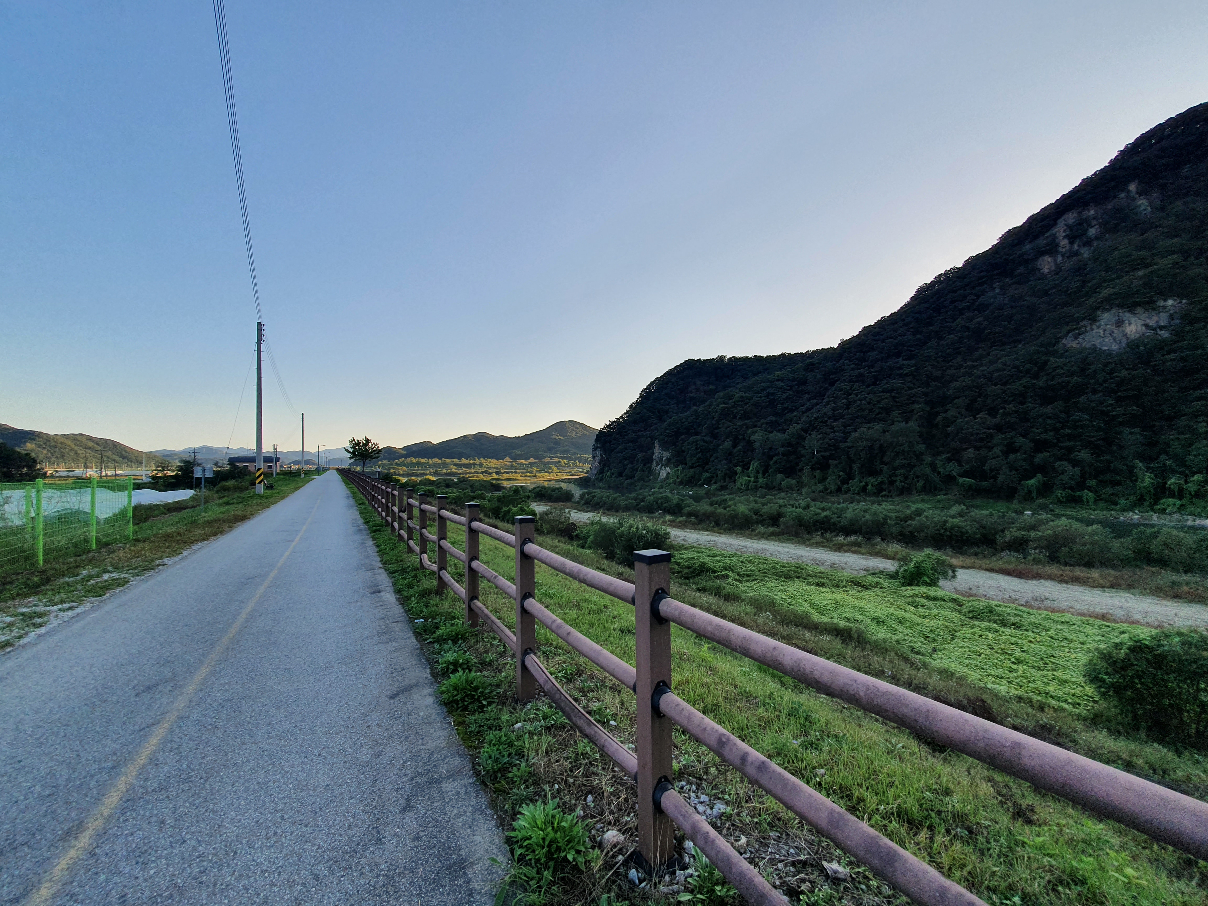 The air instantly became cooler as the sunset cast long shadows in the Gangwon valleys.