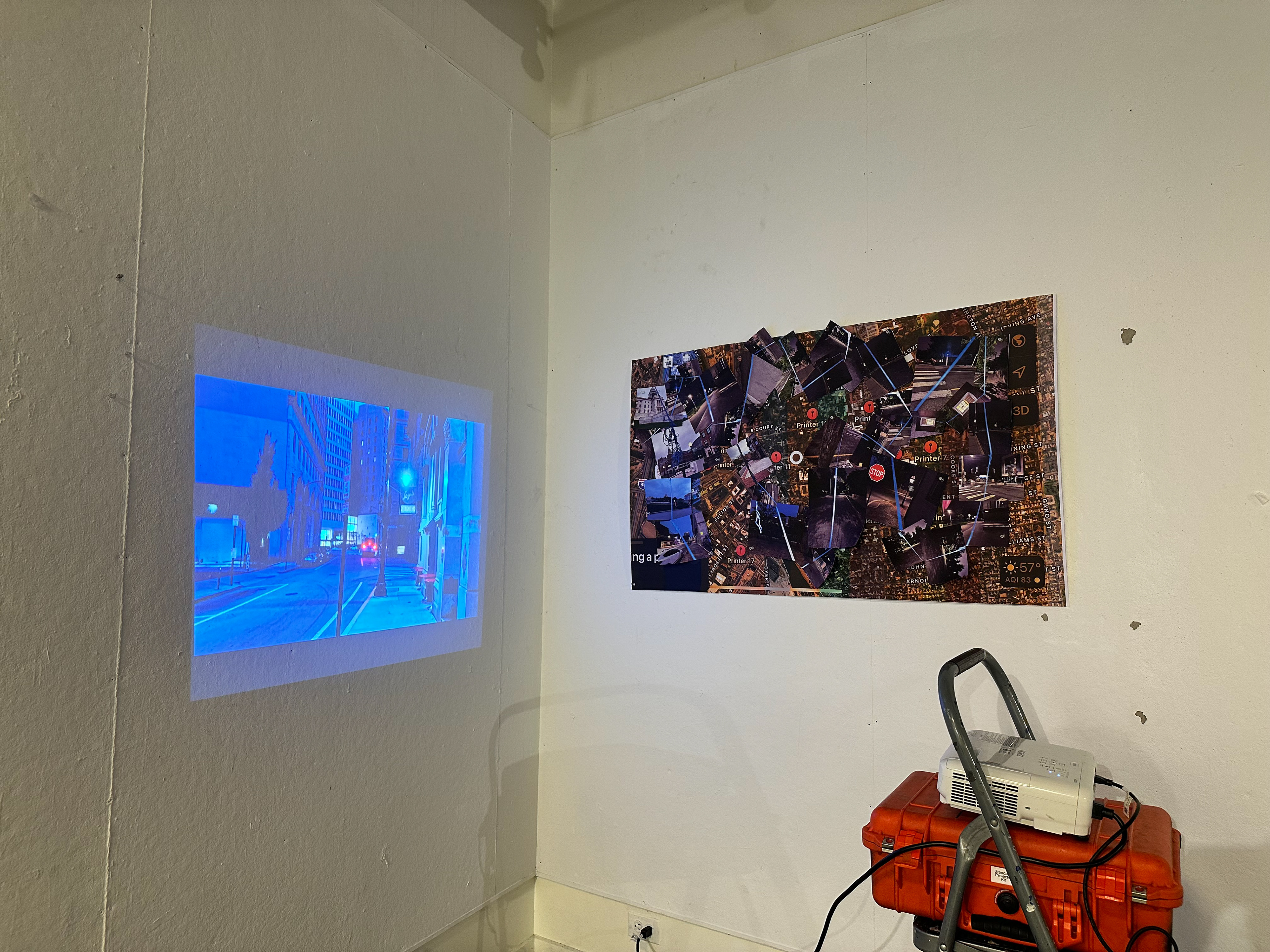 "Blue", single-channel video projection and cut-out prints, installation view