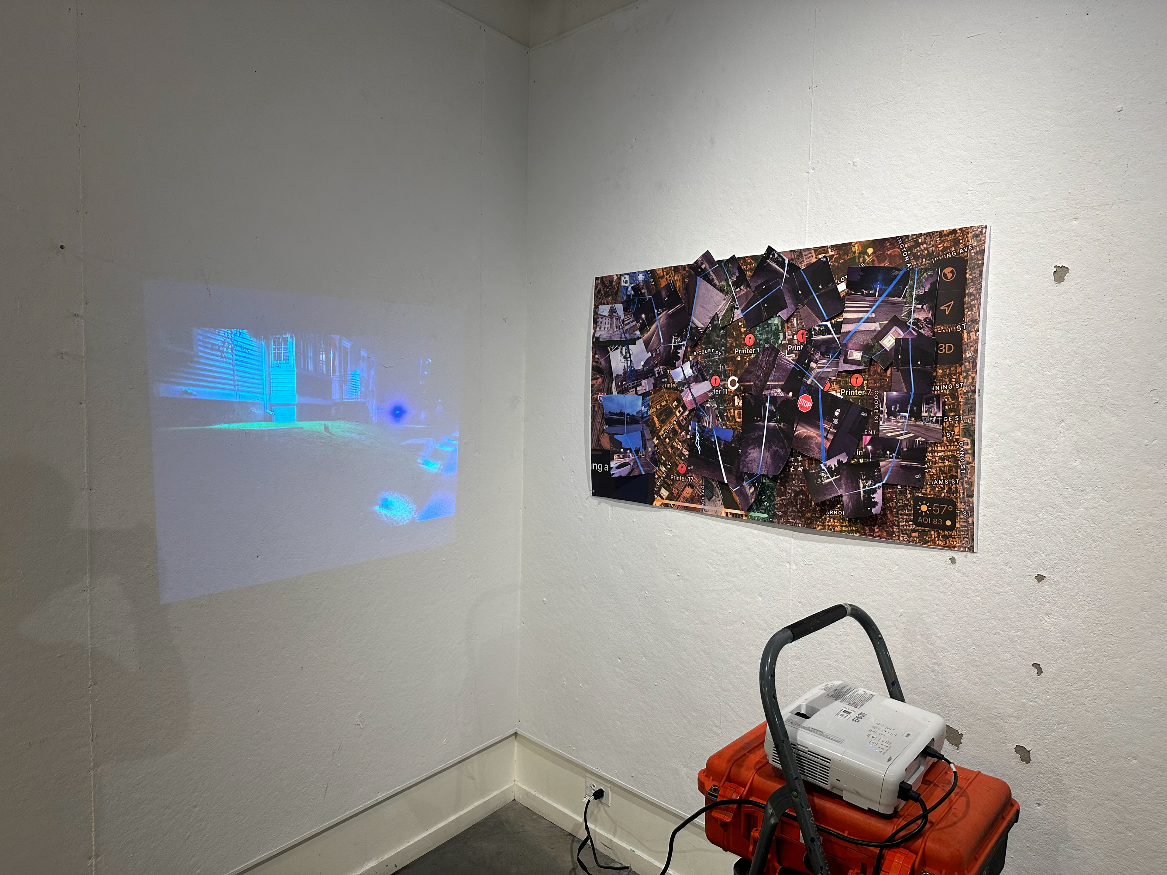 "Blue", single-channel video projection and cut-out prints, installation view
