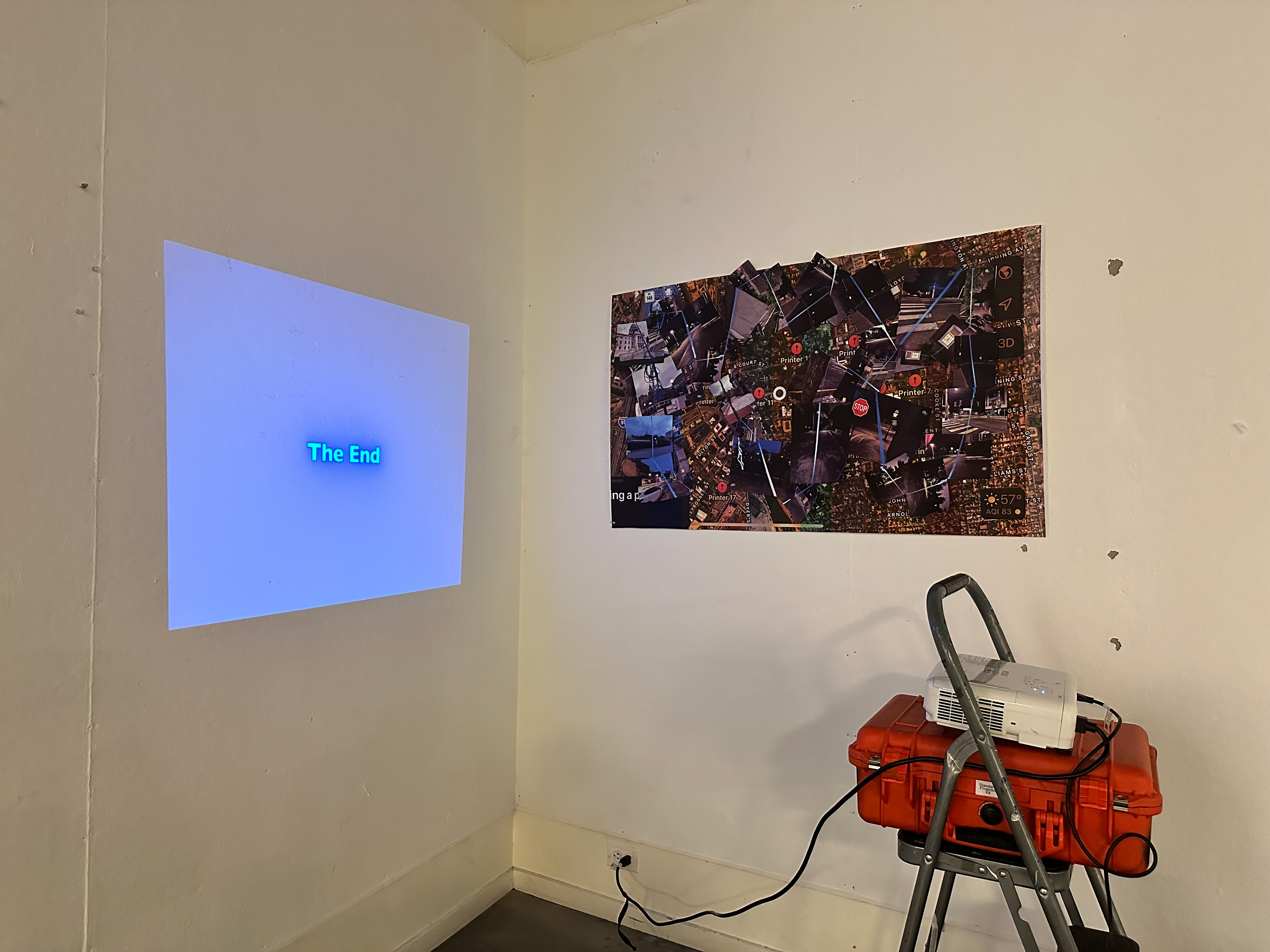 "Blue", single-channel video projection and cut-out prints, installation view