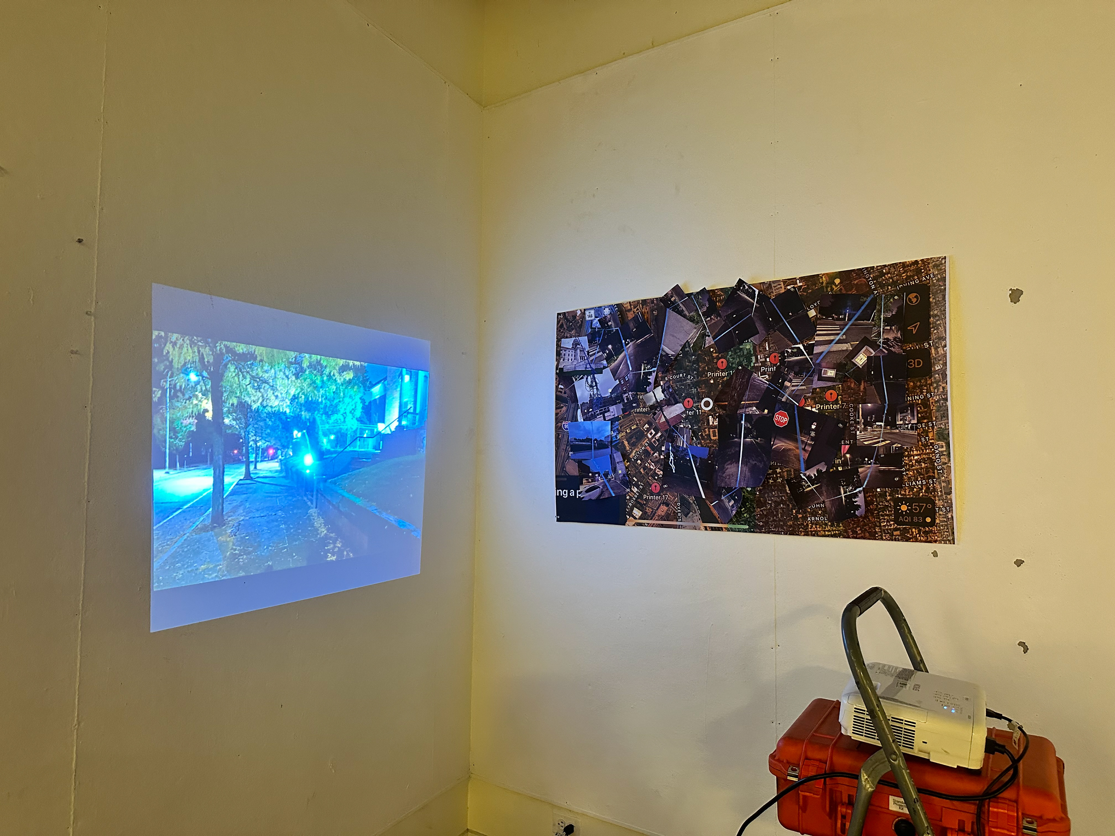 "Blue", single-channel video projection and cut-out prints, installation view