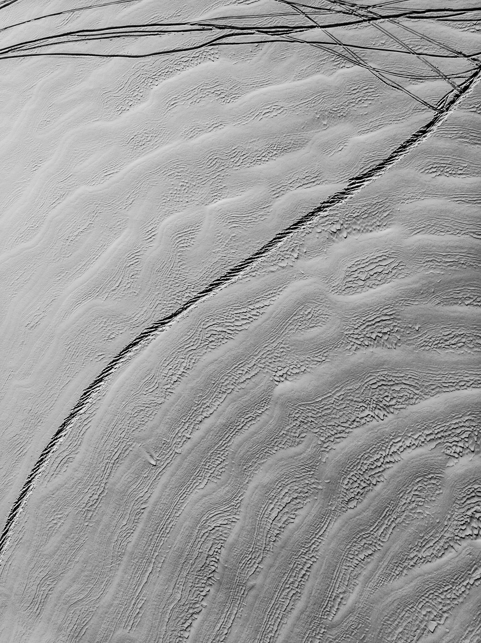 Tracks in the snow at Grand Massif, France - Taken with DJI Mavic Air