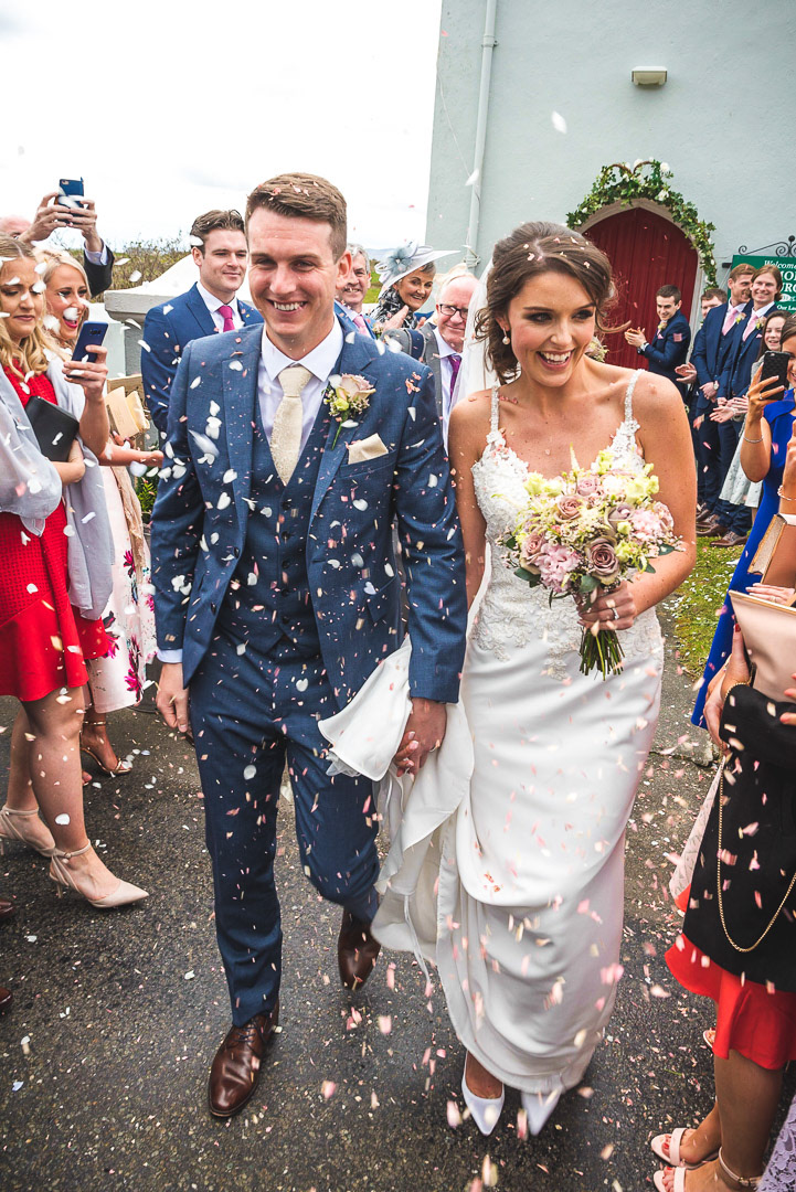 Wedding photography - couple celebrate with confetti, Cork, Ireland