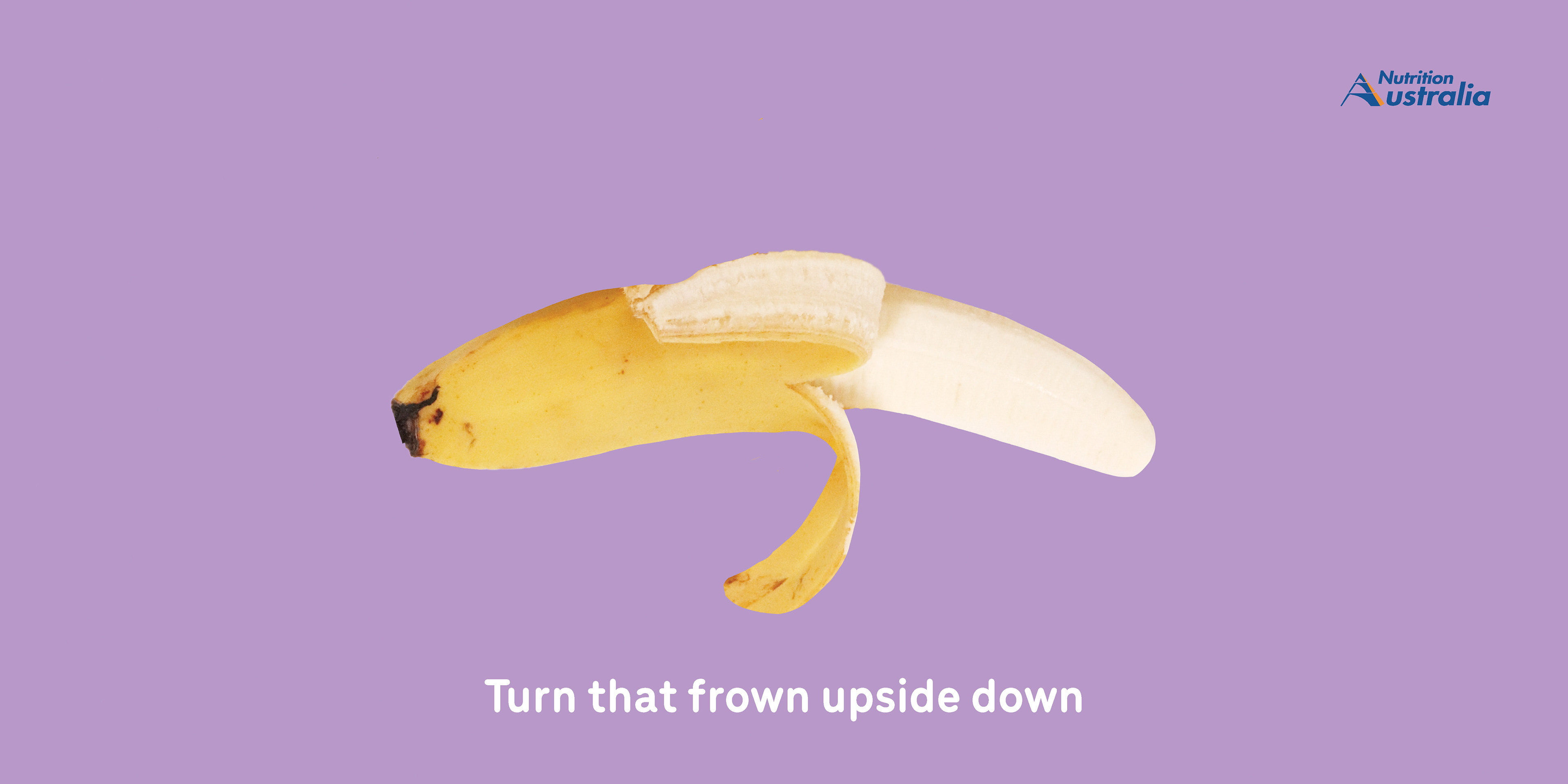 A poster with an upside banana with the tagline "Turn that frown upside down".