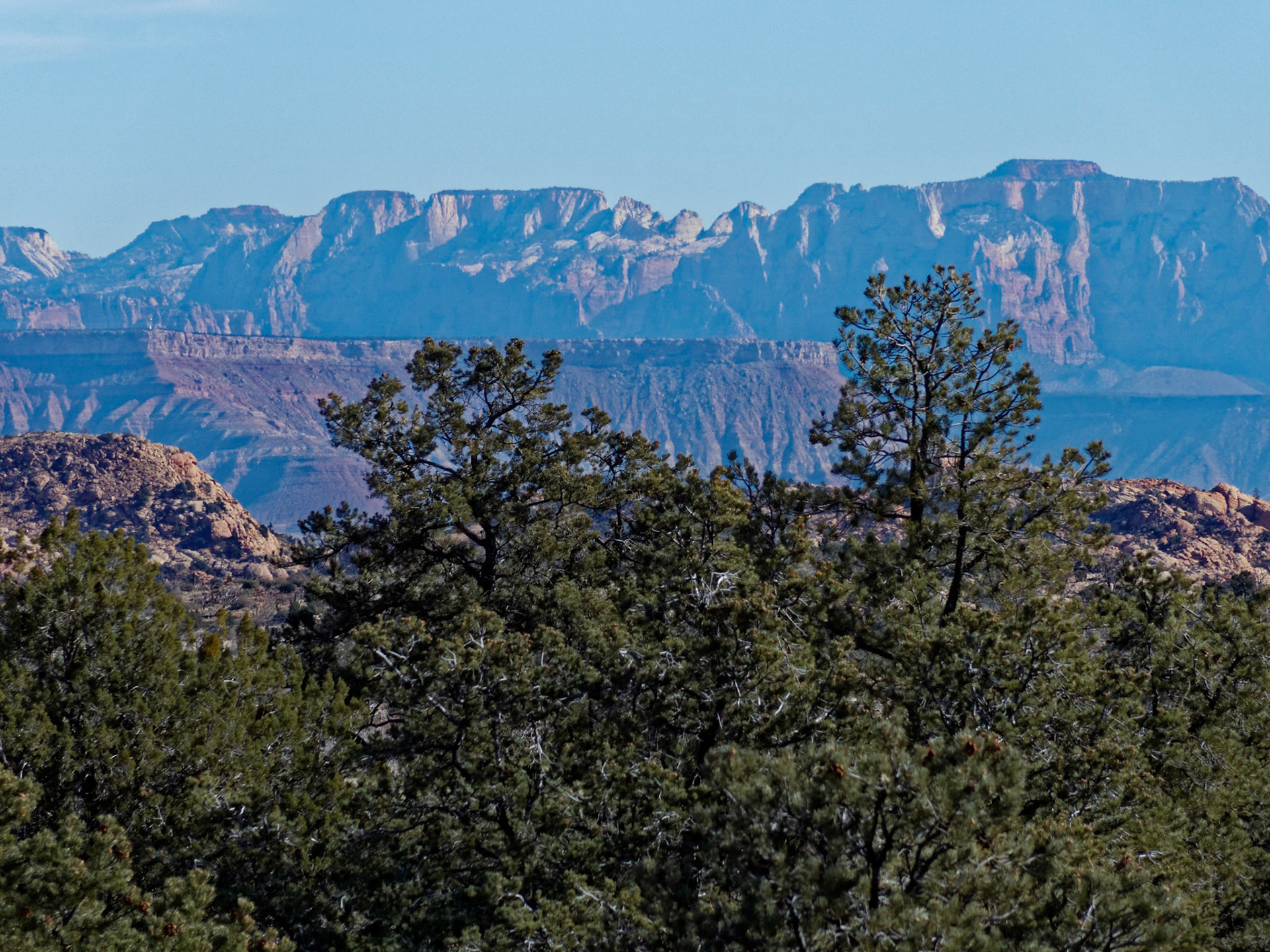 There are good views across to West Temple and the peaks of Zion 25 miles away.