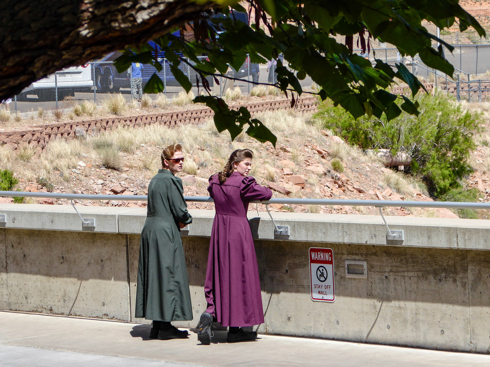 Two ladies dressed in traditional FLDS "prairie dresses" at the Glen Canyon Dam.