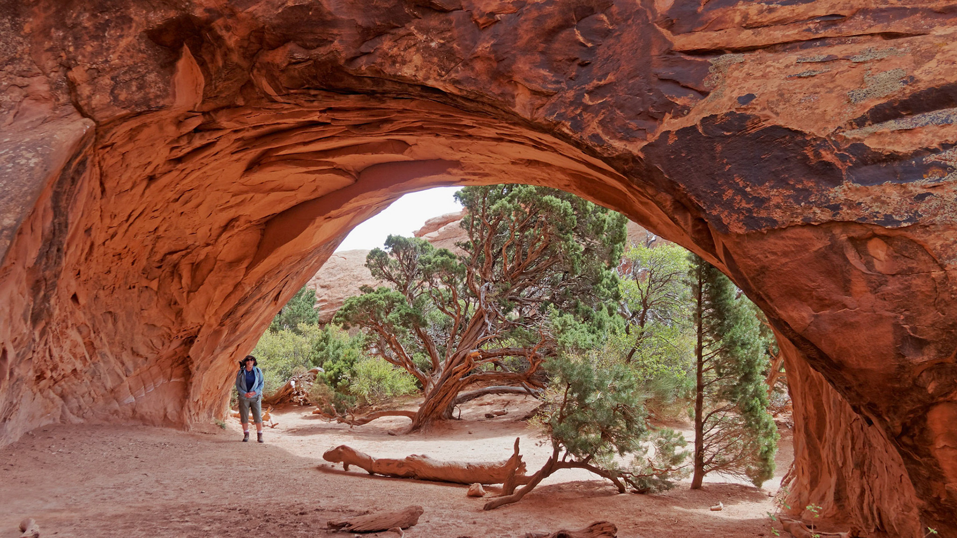 Jenny in Navajo Arch, Devils Garden, Arches National Park.