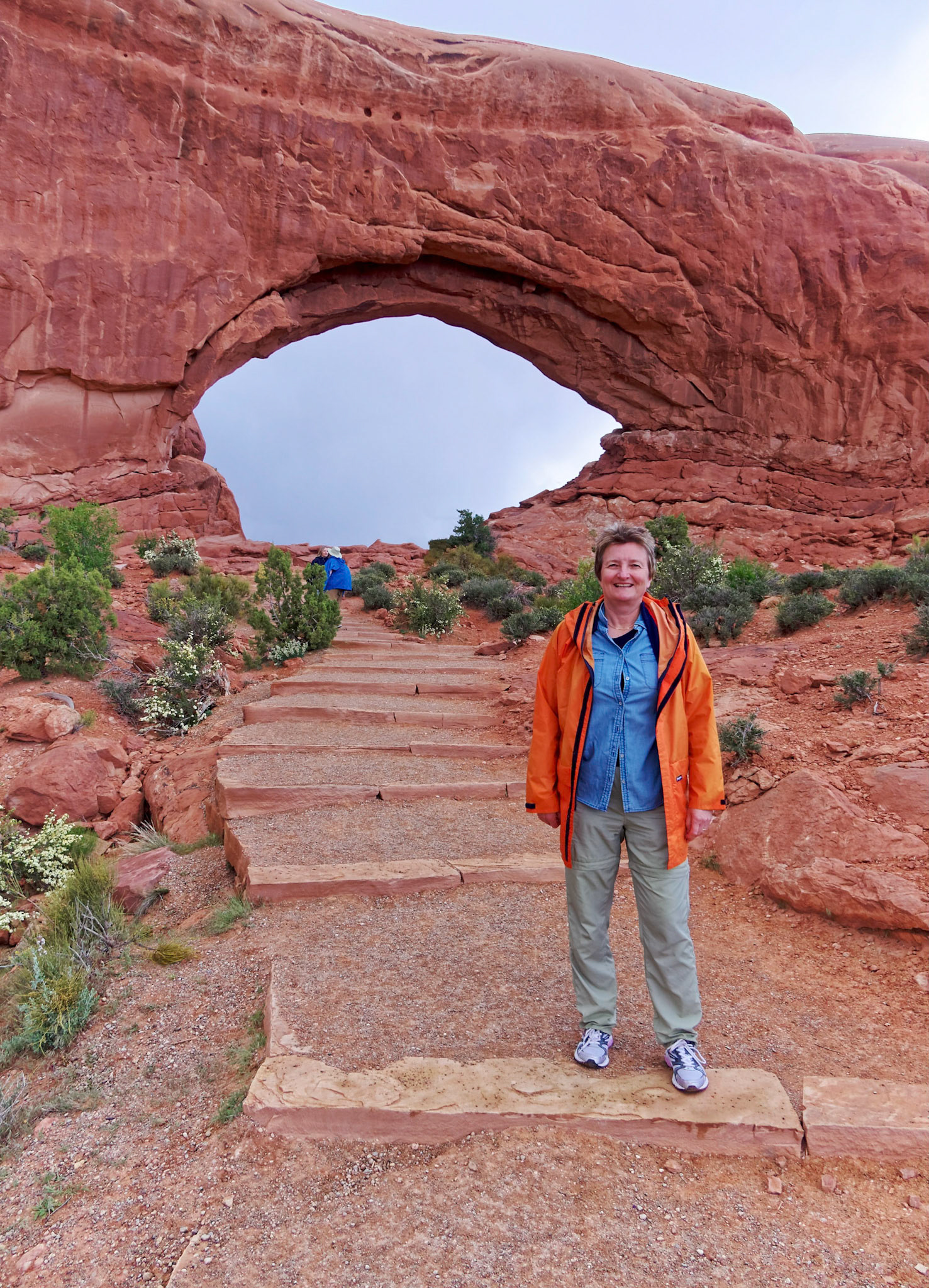 Jenny in front of the North Window in the Windows Section of Arches National Park.