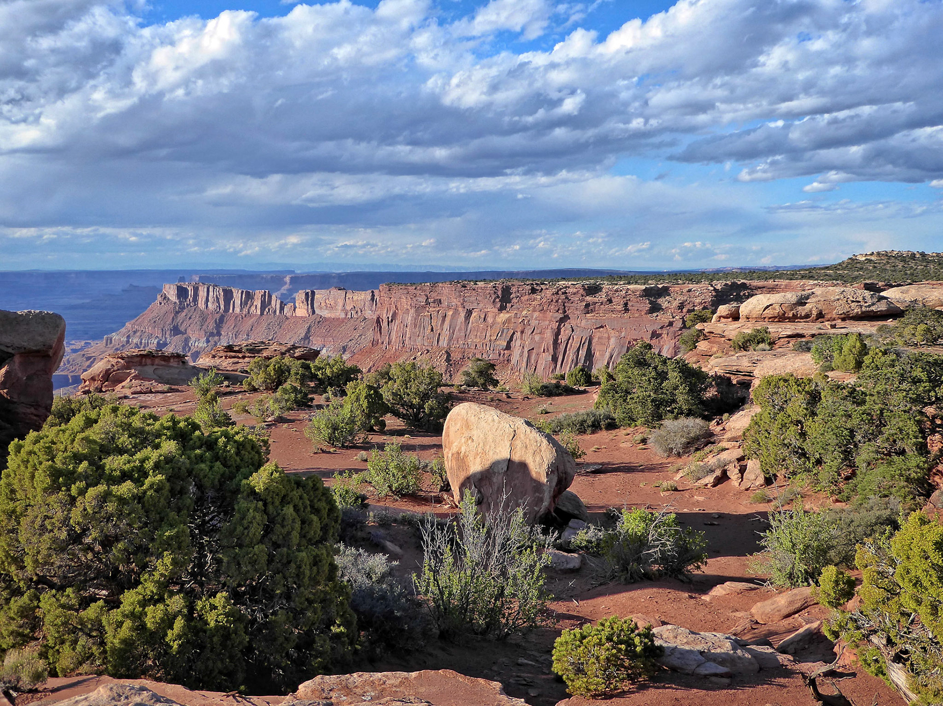 Looking north along the cliffs towards Dead Horse Point in the distance from the Needles Overlook.