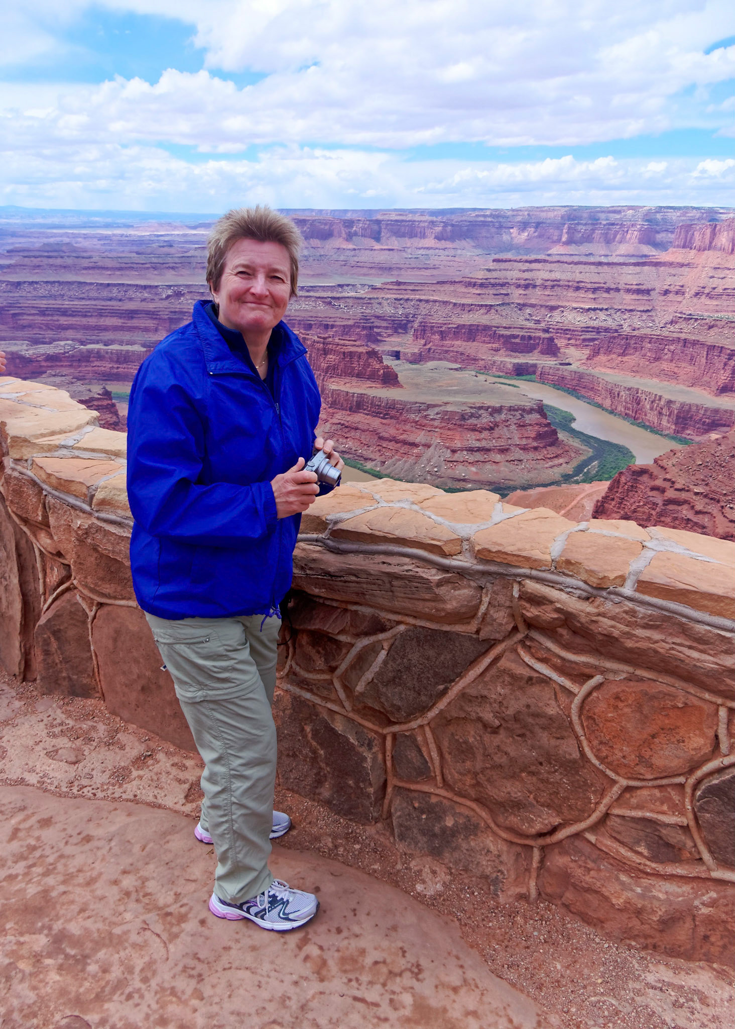 Jenny at Dead Horse Point with the Colorado River below.