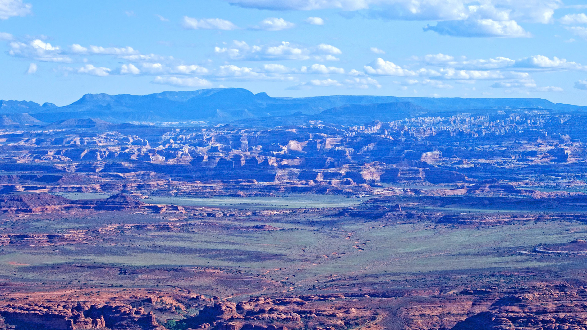 Looking south from the Needles Overlook over the Indian Creek area towards the Abajo Mountains.