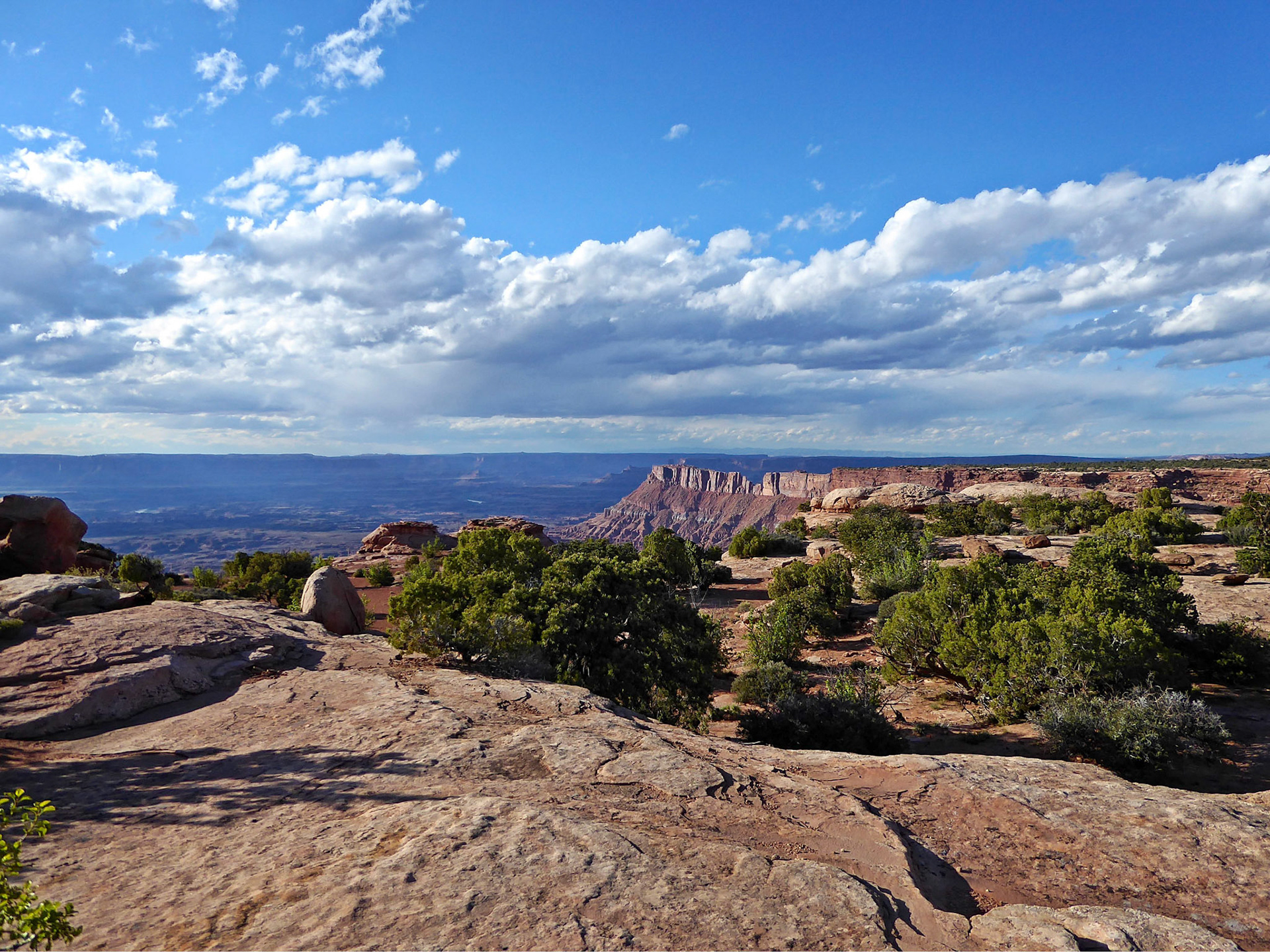 Looking north along the cliffs towards Dead Horse Point in the distance from the Needles Overlook.