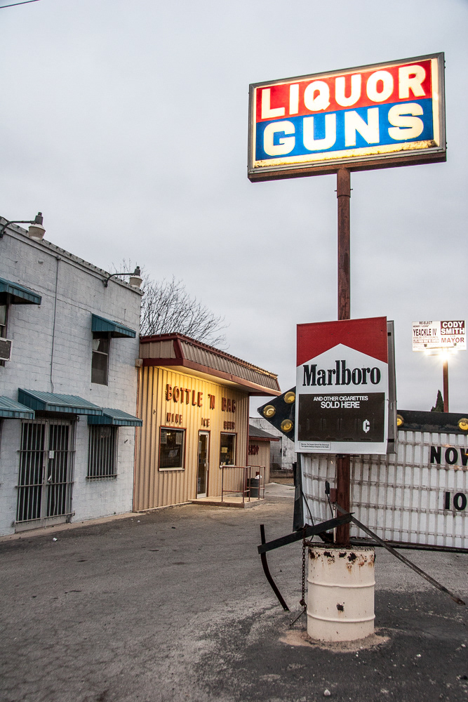 'Liquor and Guns' ~ Uvalde Texas......Long a well known pit stop in Uvalde, Liquor and Guns has been around a long time. In fact, they did sell liquor and guns in the past, but that time is gone.  They did keep the best part of the business though, which is the sign.  I mean, you can't say "Liquor and Guns" without having some craziness run through your mind.  But to many, L&G is a symbol of Texas freedom; sort of like "Come and Take It".  We know liquor and guns generally don't mix well - but we don't like being told what we can and can't do.  And if we want liquor and guns, but God, we'll have liquor and guns!