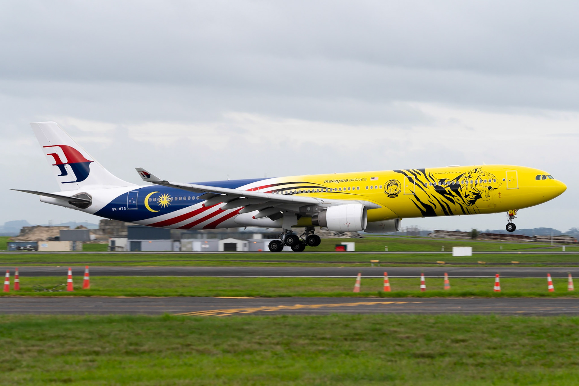 Malaysia Airlines Airbus A330-300 9M-MTG wearing the Harimau Malaya special scheme.