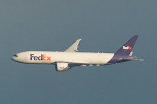 FedEx Boeing 777F arriving in Auckland.