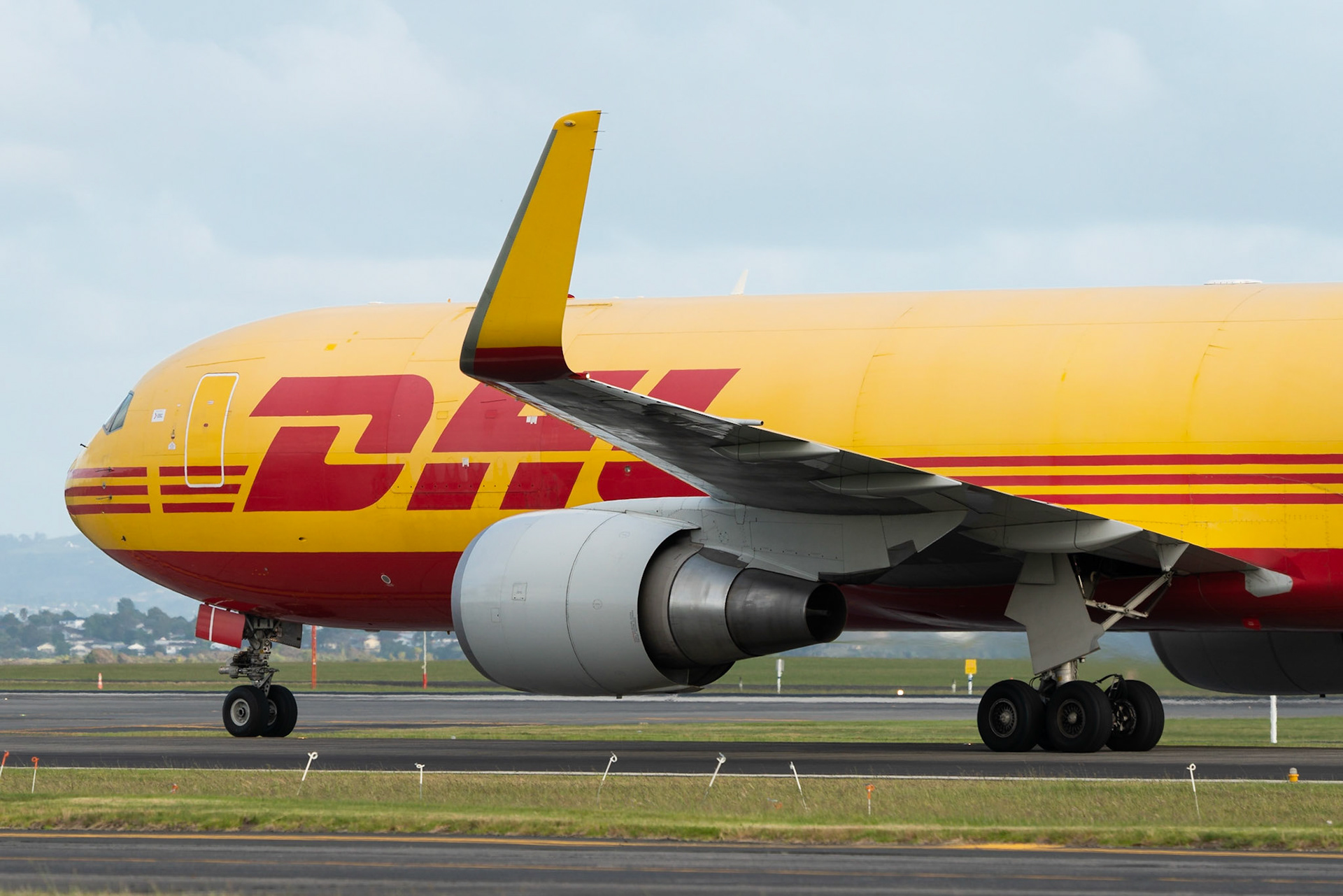 DHL Boeing 767-300 VH-EXZ arriving in Auckland