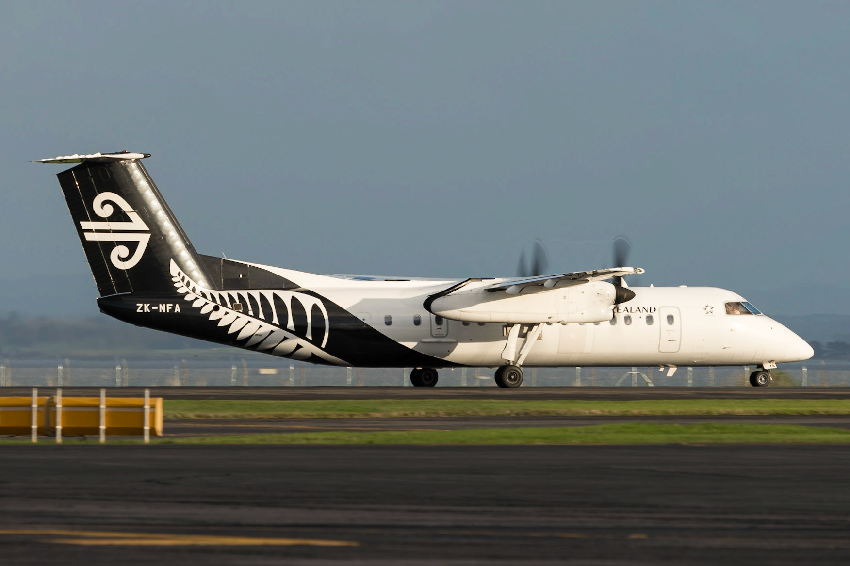 Air New Zealand Bombardier Q300 ZK-NFA departing Auckland.