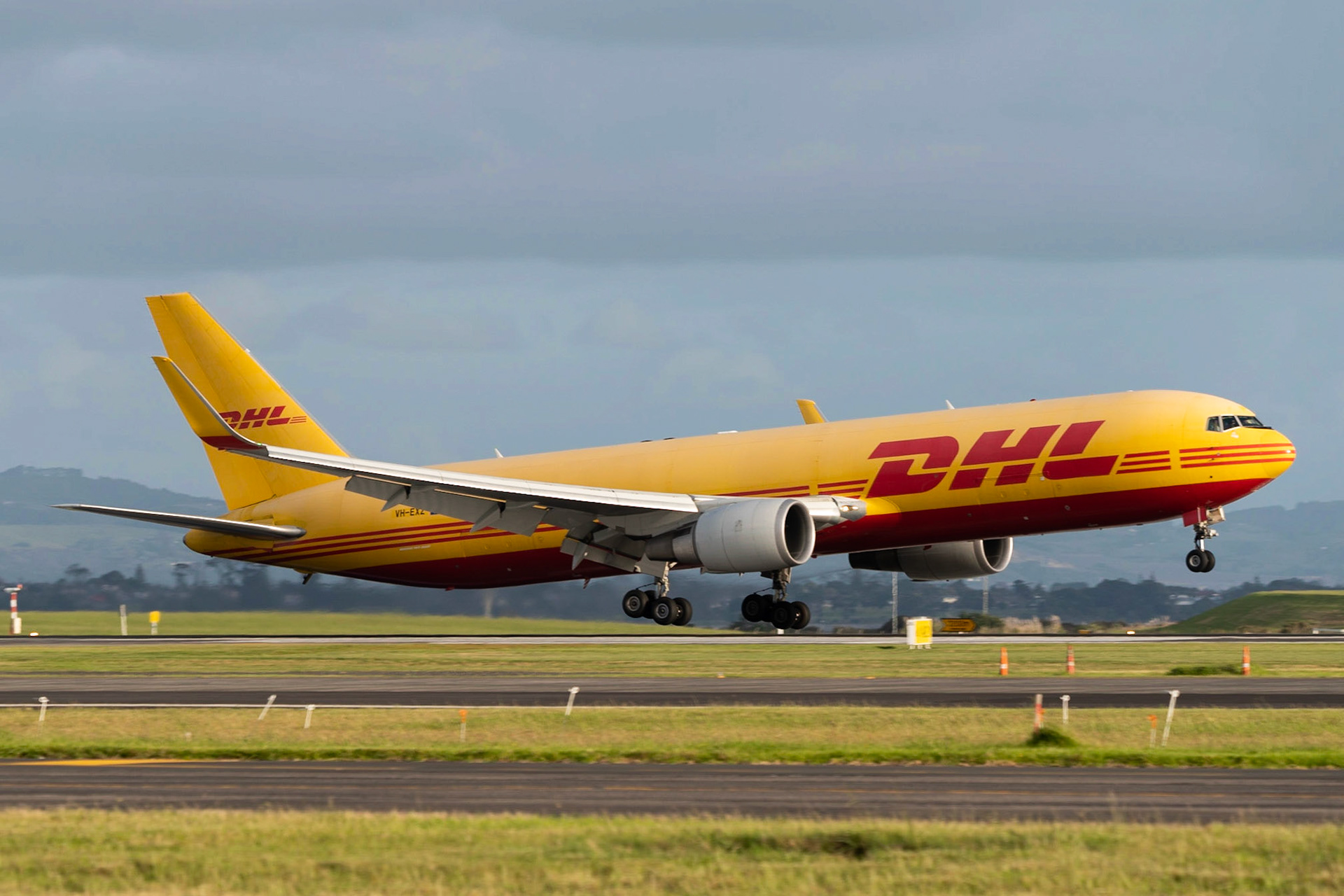 DHL Boeing 767-300 VH-EXZ arriving in Auckland