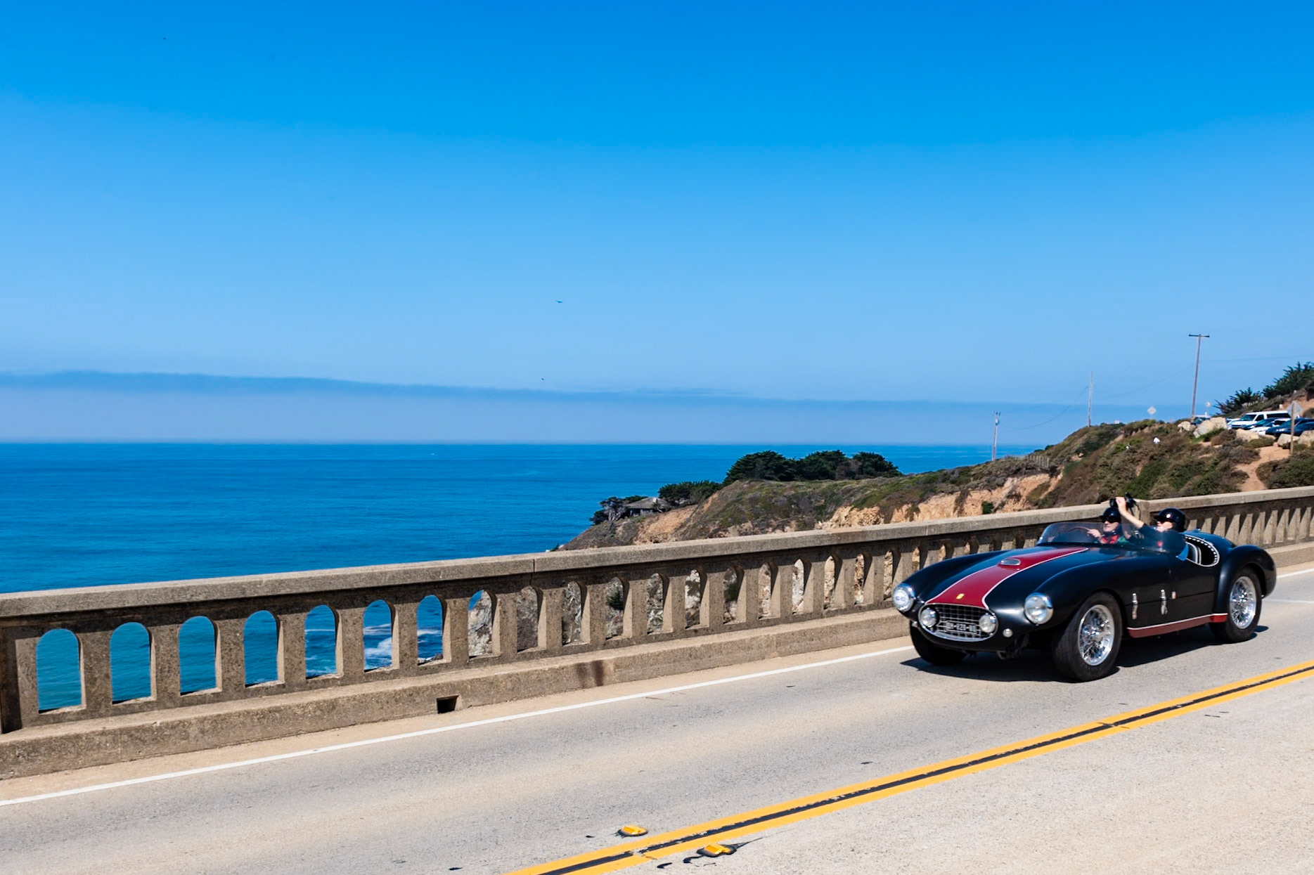 This 1953 Ferrari 166 MM first carried a Vignale coupe body when delivered to its first owner, Jaques Herzet. After racing in the Coupe de Spa-Francorchamps, the Rallye des Alpes, the Liege-Rome-Liege, and the Tour de France, the car placed second in the 1953 European Championship. Herzet then took the car to South America for another series of races. After returning to Europe, the car was sent to Carrozzeria Oblin in Brussels to be re-bodied as the spyder it is today. With its new look, this 166 MM (chassis 0300M) soon raced again; at the 1954 Twelve Hours of Reims, Herzet shared the drive with Johnny Claes. The car’s racing days continued until 1957 when Herzet hung up his goggles for the last time. The car has recently changed hands and has been restored to the condition it was in at the end of the 1954 season, with matte-black paintwork and a glossy red racing stripe.