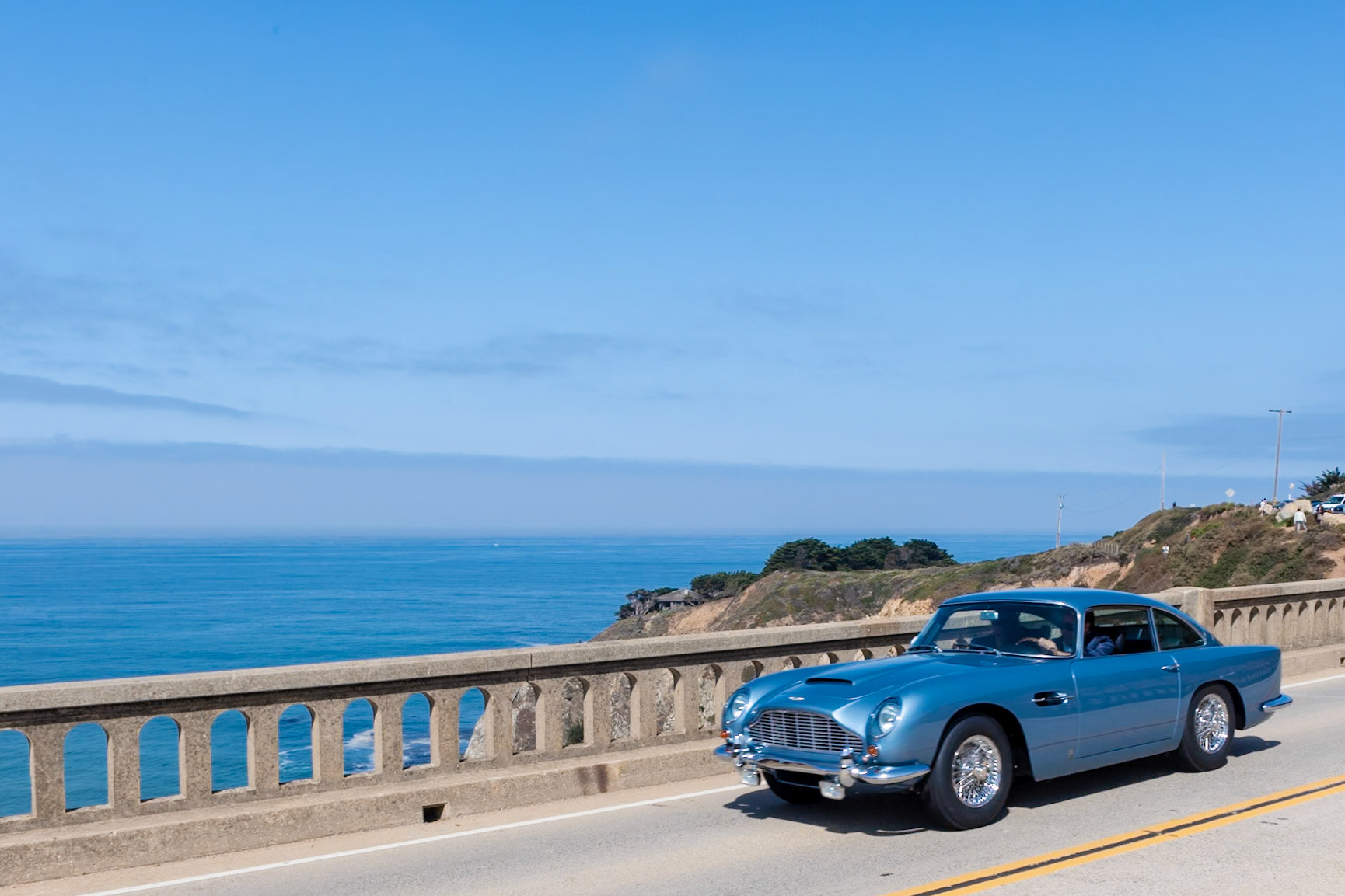 Designed by Carrozzeria Touring and released in 1963, Aston Martin’s replacement for the DB4 used a new all-aluminum engine enlarged from 3.7 to 4.0 liters with triple SU carburetors as well as a new five-speed transmission, as was used in the outgoing DB4 Vantage. The DB5 also shared the latter’s faired-in headlamps. Built for Prince Abdul Ilah Bin Abdulaziz of Saudi Arabia, this Aston Martin DB5 (chassis 2270/L) was the sixth from last DB5 chassis to be built at the Aston factory in Newport Pagnell and was probably the last to be delivered. The car was equipped with every factory accessory available, including air conditioning, Marchal fog lamps, a heated rear screen, three-eared hubcaps and the rare Continental touring kit. Coming at the end of DB5 production, many of its additional features became standard equipment on its replacement, the Aston Martin DB6, launched a few months after this car was completed.