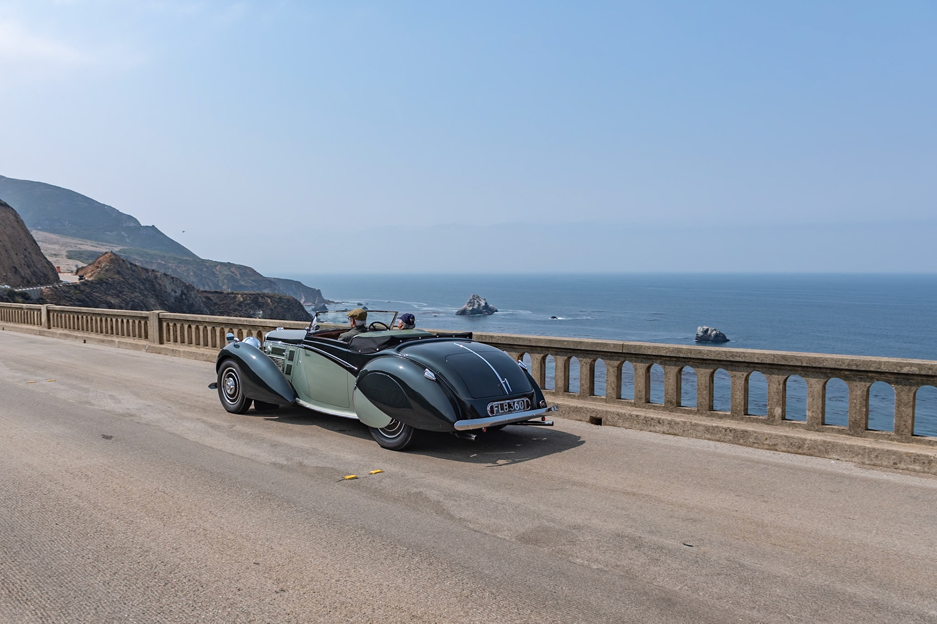 Alan P. Good, the new owner of Lagonda in 1935, recruited W. O. Bentley as his chief engineer to work on a range of engines and chassis. W. O. and his team designed an entirely new model, the Lagonda V12, which was built between 1937 and 1940. It is considered one of the finest V12-engined cars of the prewar era. The Lagonda V12 chassis featured independent torsion-bar front suspension and modern hydraulic drum brakes, and it wore bodywork ranging from open tourers to more formal limousines. Seventeen of the sportier Rapides were built on a shorter 124 inch wheelbase and had sleek drophead coupé coachwork penned by Frank Feeley and built in-house. This Lagonda Rapide is fitted with one of eight Le Mans specification engines, which featured four instead of two carburettors. In recent years it has had a ground-up restoration, and it has been shown at several events and driven on many rallies and tours.