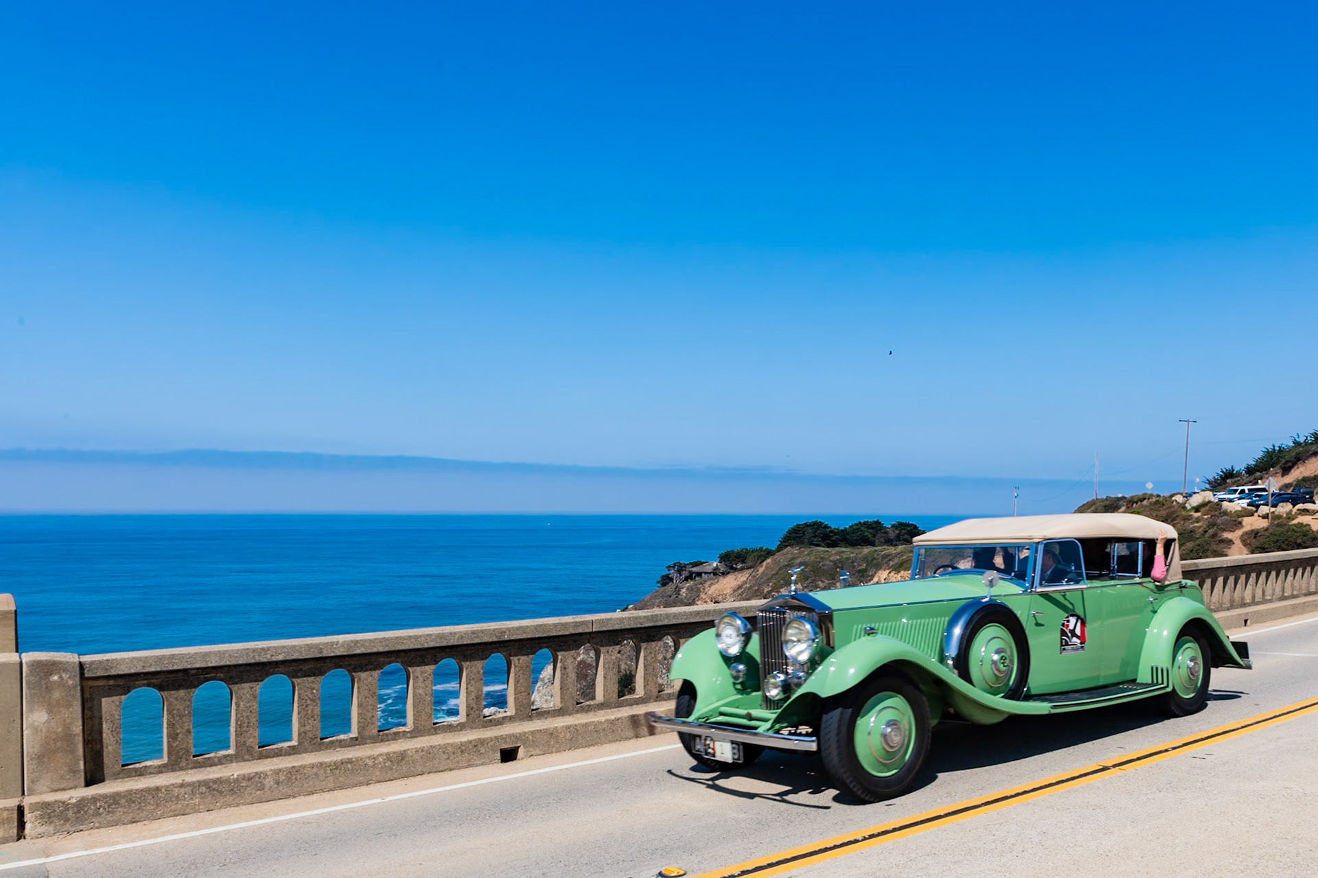 The Phantom II was the last model designed by Henry Royce in 1929. It had an entirely new low-slung chassis with its radiator set farther back, allowing coachbuilders to create much sleeker designs. It was available in two lengths, long for more formal cars and a shorter Continental version for more sporting cars. By the end of production the Phantom II Continental could achieve speeds of over 100 mph. This well-known example (chassis 4PY) was shown at the 1933 Paris Auto Salon before being delivered to its first owner, D. A. Sursock of Paris. In 1935 it was purchased by Britain’s Lord Faringdon, who owned the car until the 1960s. Soon after the purchase, the Phantom II was used by King George V at a review of a RAF squadron in Suffolk. Its current owner has enjoyed the car since 1984, driving it extensively on tours all over the United States.