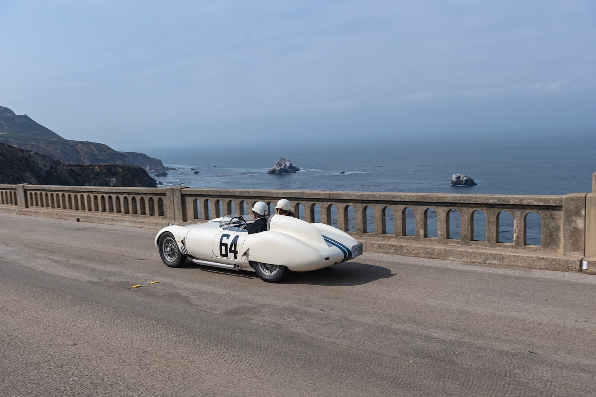 The OSCA S273 was originally designed for the 1100 cc OSCA engine, although this car (chassis 767) was fitted by the factory with the tiny 750 cc 4-cylinder, 75 bhp motor. It was ordered by Briggs Cunningham and was delivered in the summer of 1959 to Cunningham’s race manager, Alfred Momo in New York City, who prepared it for the Cunningham team. Cunningham owned several OSCAs in period, and the S273 was entered at six events during 1959. The car’s most significant race was at the 1960 12 Hours of Sebring, where it was co-driven by Denise McCluggage and Marianne Windridge. After that the car was not used again by the Cunningham team and was sold to privateer Cecil Schoeneman who drove it in several races in the Midwest. At this point, the original 750 cc engine was at the end of its life, and a larger 860 cc Tipo 187 engine was fitted. Then the car was sold to Dr. John Hunholz of Washington. He restored the OSCA, keeping it for the next four decades, until its current owner acquired the car in August 2015. It has now been restored again and wears its original Cunningham livery.