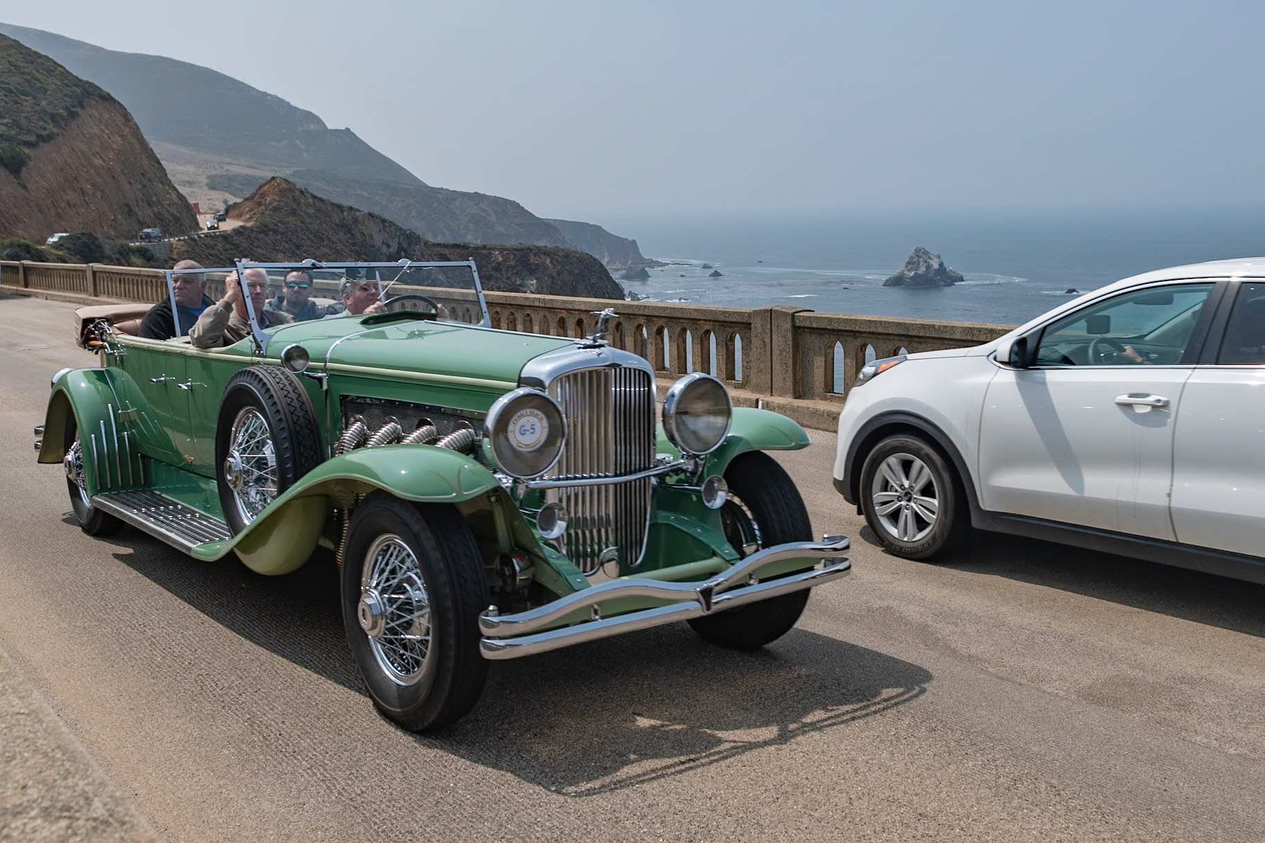 The Duesenberg Model J was available on either a long wheelbase of 153.5 inches for 7-passenger coachwork or a standard chassis of 142.5 inches. This Duesenberg J with Tourster coachwork by Derham is built on the longer chassis. The Tourster style was designed by Gordon Buehrig and, unlike other Dual Cowl Phaetons, it features a second windshield that slides up and down behind the front seat by means of a crank handle. The Tourster was Buehrig’s favorite design and he chose the Derham Body Company of Rosemont, Pennsylvania, to be the exclusive builder of this coachwork. This Duesenberg (J451) is one of eight original Tourster models. It was sold new to David G. Joyce of Chicago. Today it is one of very few remaining original examples of what many consider to be Derham’s most beautiful coachwork.