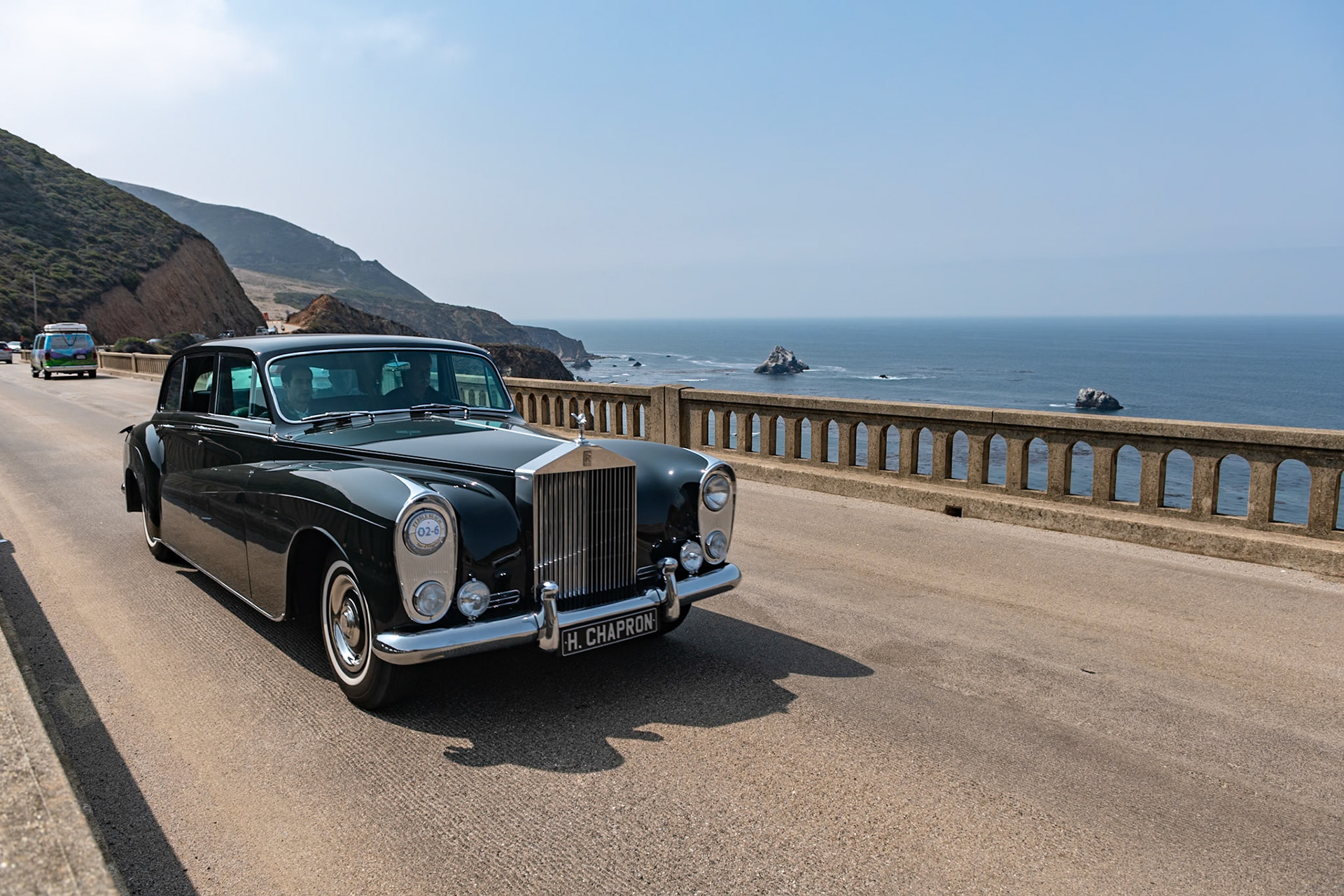 The new top-of-the-range Rolls-Royce Phantom V, introduced in autumn of 1959, replaced both the Phantom IV and the Silver Wraith. It had a new 6,230 cc all-alloy V8 engine that was also used in Silver Cloud II and Bentley S2 saloons, and it was built on a modified and strengthened Rolls-Royce Silver Cloud II 145-inch wheelbase chassis. With suitably luxurious coachwork, the finished cars measured well over 20 feet in length. Despite its size, the Phantom V was still quite capable of exceeding 100 mph. Many of the first orders came from the royal families of Europe and other dignitaries, but the bulk of inquiries came from industry or private individuals. Over the course of its 9-year production run, 516 Phantom Vs were sold, and most were built in England. This striking Limousine is an exception, boasting what is possibly Henri Chapron’s largest-ever body, designed for Mrs. K. Millbank of Paris. It first appeared at the 1961 Paris Auto Salon and has just been restored to its appearance there, with the deep green paintwork and pale green interior.