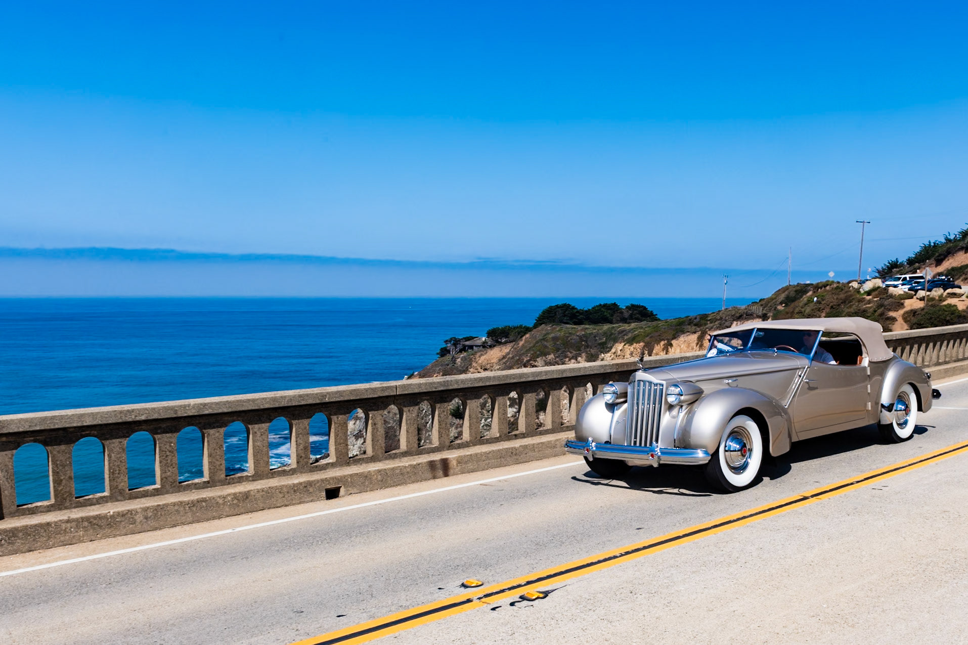 Packard’s Super-8 range was divided into two series—the 1703 on a 127-inch platform and the 1705 on a larger 148-inch wheelbase—with both using the same straight-8 engine. In 1939 Packard halved the number of body styles for the Super-8 and introduced a new 356-cubic-inch engine, which was highly successful and continued on Packard’s larger models until 1950. Darrin’s Convertible Victoria was still an option, and this example is one of the first built on the shorter 1703 chassis in 1939. The very first of Darrin’s Packard Convertible Victorias was built for movie actor Dick Powell in 1937, and the Hollywood crowd so admired the car that many of the stars of the day, including Clark Gable, Tyrone Power, Errol Flynn, Al Jolson, Ruby Keeler, and Gene Krupa, became Darrin customers. This particular car, with its trademark aluminum cowl and “Darrin-dip” doors was built for the cowboy actor Tom Mix and it has just been restored to its original configuration.