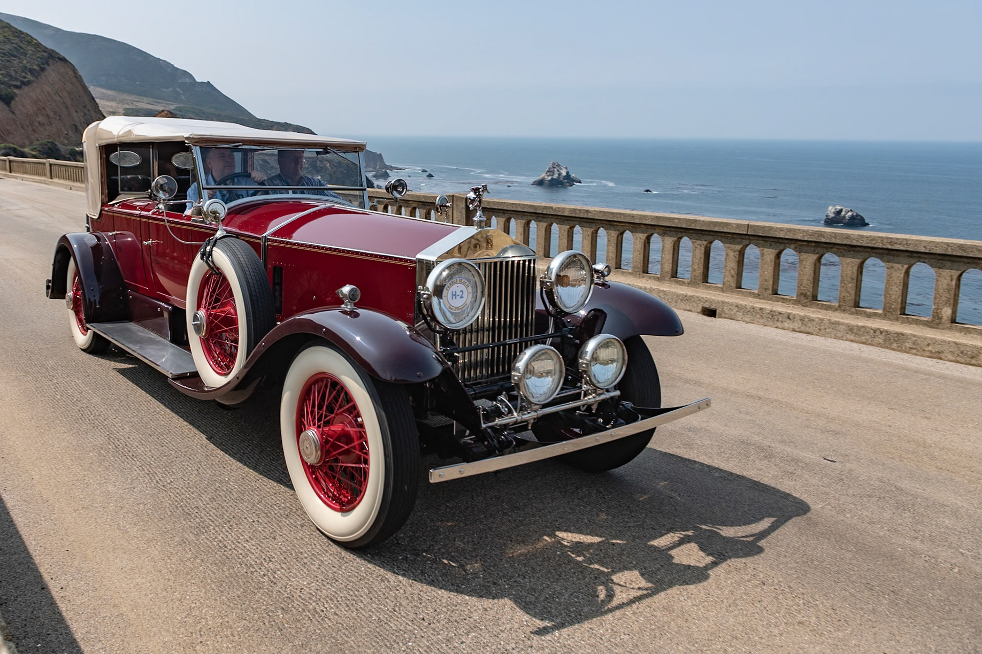Known as “The Duchess,” this Phantom I Dual Cowl Torpedo Phaeton (chassis 43AL) was built in England and fitted with coachwork by Barker of London. The car boasts several upgrades, including cowl-mounted Zeiss spotlights and a trunk rack complete with a rare Brooks travel trunk. With the tall Auster windscreen to shield its rear passengers, the car was designed for continental touring for its first owner, Sir John Harmsworth, who owned the London Daily Mail newspaper and founded the Perrier Sparkling Water Co. His car was ordered as an exact replica of the Phantom I owned by Sir John’s brother, Lord Rothermere, that later appeared in the film Supergirl starring Faye Dunaway. Sir John owned the car for four years until his death in 1933, and then it passed through five different owners before being purchased by the current owner’s father in 1963. After restoring The Duchess, Irving Jensen Sr. showed it at the Pebble Beach Concours in 1976, when Irving Jr. was just 8 years old. The car is now in the hands of Irving Jensen III.