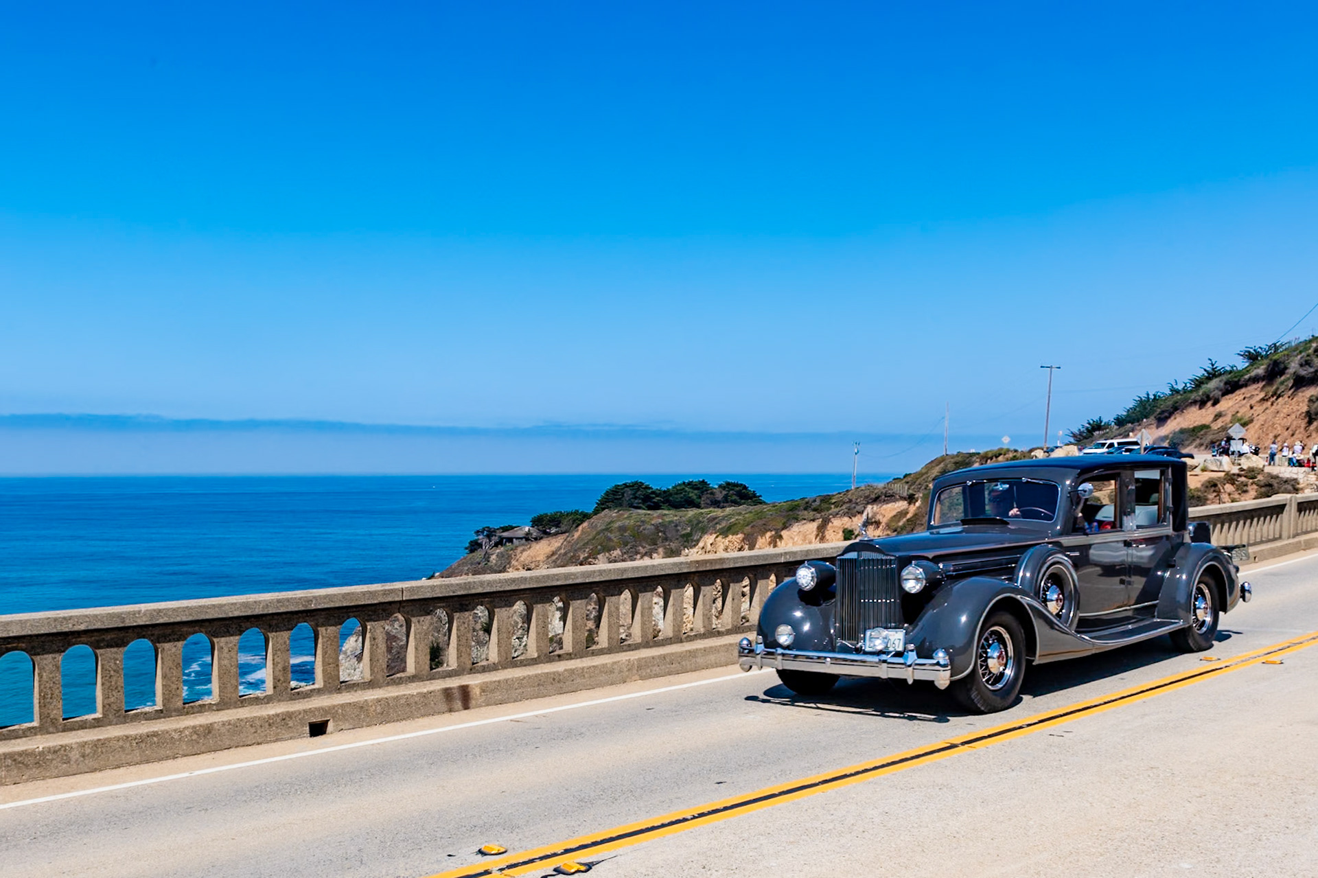 This 1935 Packard Twelve was ordered by one of the wealthiest couples in America, Marjorie Merriweather Post, sole heir to the Post cereal fortune, and her husband, financier E. F. Hutton. The Brewster limousine coachwork had originally been fitted to a Rolls-Royce Phantom that Hutton had purchased in 1928. The Humer-Binder Co. in New York was commissioned to transfer and adapt the body to this Packard at a cost of $6,685. A solid roof for the chauffeur was added along with shatterproof glass throughout and silk window shades, the interior window mouldings were revarnished, and the car was repainted before it was delivered in early 1935. After the couple divorced, Hutton retained the car, using it regularly until 1947 when it was laid up on blocks in his garage. The car later passed to Lewis Smith of New York and Elliott Jones of California.