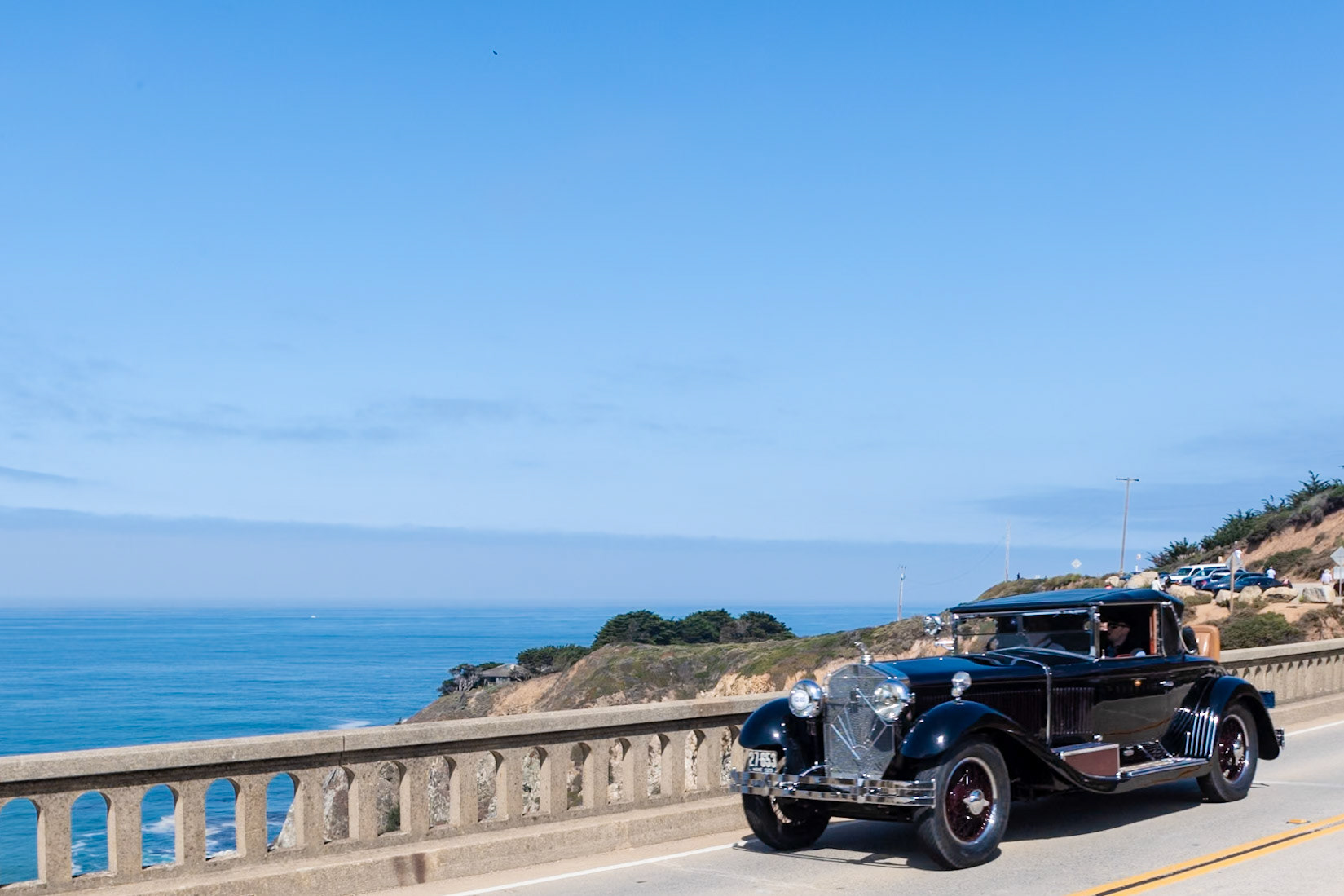 This Isotta Fraschini Tipo 8A wears a Castagna body similar to the car shown by Isotta Fraschini at the Commodore Hotel in 1928. The radiator wears one of the coachbuilder’s signature Art Deco radiator guards, and that is topped with a striking cobra hood ornament adopted by several American Isotta owners after one was first used by Rudolph Valentino. Other features typical of Castagna are the cut-glass running board lamps, German Silver landau arms, and multiple steps giving access to the rumble seat. The distinctive set of Grebel lights include a mother-of-pearl fender lamp depicting the badge of St. Christopher, the patron saint of travelers. The Bahre Collection acquired the car from the Craven Foundation in the early 1980s.