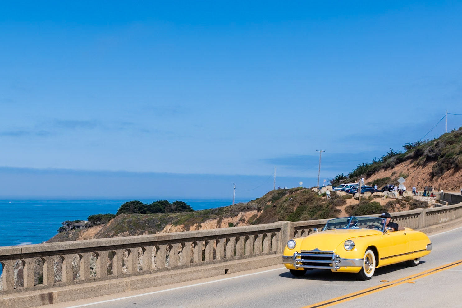 The Kurtis Sports Car has been called the first true American Sports Car. This example was a high school graduation gift from its originator, Frank Kurtis, to his son, Arlen. The gift came a year early and it came in pieces, so Arlen assembled it with the help of the Kurtis Kraft staff, finishing it in June 1951. The car has several unique features, including a dashboard that Arlen machined himself to fit Stewart Warner gauges. The front fenders are aluminum, while the rear fenders, hood and trunk lid are fiberglass. In designing the car, Frank Kurtis made certain there was no trace of fender contour. The bumper also really wraps around—the whole car. Arlen sold this car when he joined the Navy in 1952. Arlen’s wife and his sister bought it back for him as a surprise Christmas gift in 1990, and he completed its restoration in 2011, 60 years after he first built it. Arlen passed away in May of last year. The car is displayed here in memory and honor of both Frank and Arlen Kurtis.