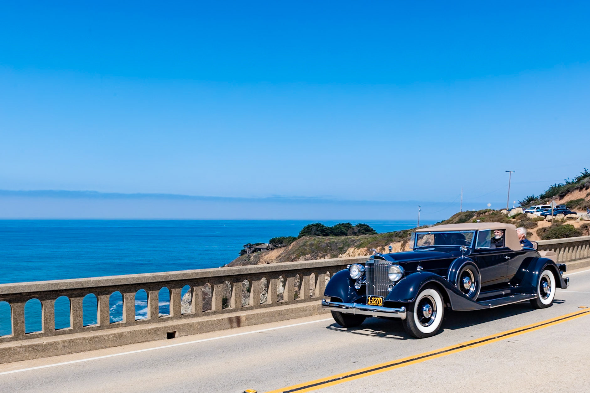 Packard introduced its Eleventh Series cars in August 1933 and it remained in production for two years. Three models, the 8-cylinder Eight and Super Eight, and the V12-engined Model Twelve were available in 41 different combinations of wheelbases and factory body styles as well as 17 custom bodies by two coachbuilders, LeBaron and Dietrich. This Super Eight Coupe Roadster was first sold to an owner in Santa Barbara who kept it until after World War II, when it was displayed in the Sacramento hall for Veterans of Foreign Wars. Since then it has enjoyed a long and noteworthy relationship with the Pebble Beach Concours. Its current owner first showed the car at Pebble Beach when he was 17 years old, in 1958, then again in 1959, 1962 and 1963. The car has since taken part in three cross-country Great American Races as well as many other tours, covering over 200,000 miles. Its first ever body-off restoration was begun in 2015, and it is now being shown in its original Packard Blue.