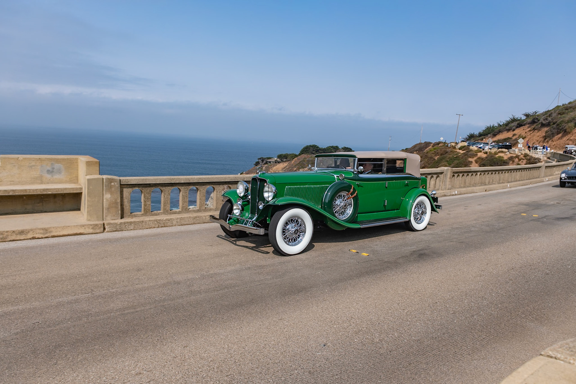 In 1932, E. L. Cord’s Auburn Automobile Company launched a luxurious V12-engined car to compete with offerings from Lincoln, Pierce-Arrow, and Cadillac. Designed by chief engineer George Kublin, the narrow 45-degree V12 produced 160 horsepower from 391 cubic inches. And the car was fitted with Auburn’s famous Dual-Ratio rear axle, which allowed it to be driven either in high-gear ratios for open country roads or in a lower ratio designed for city driving. The coachwork styling from Alan Leamy made these Auburns some of the most beautiful cars of the classic era. Built from 1932 to 1934, the Auburn was listed at a very reasonable $1,795, but due to the economic climate of the time, this price was reduced to an almost cheap $1,295. Recently restored by its current owner, this Auburn 12-160A Phaeton is the earliest surviving example from the seven listed in the Auburn Cord Duesenberg directory.