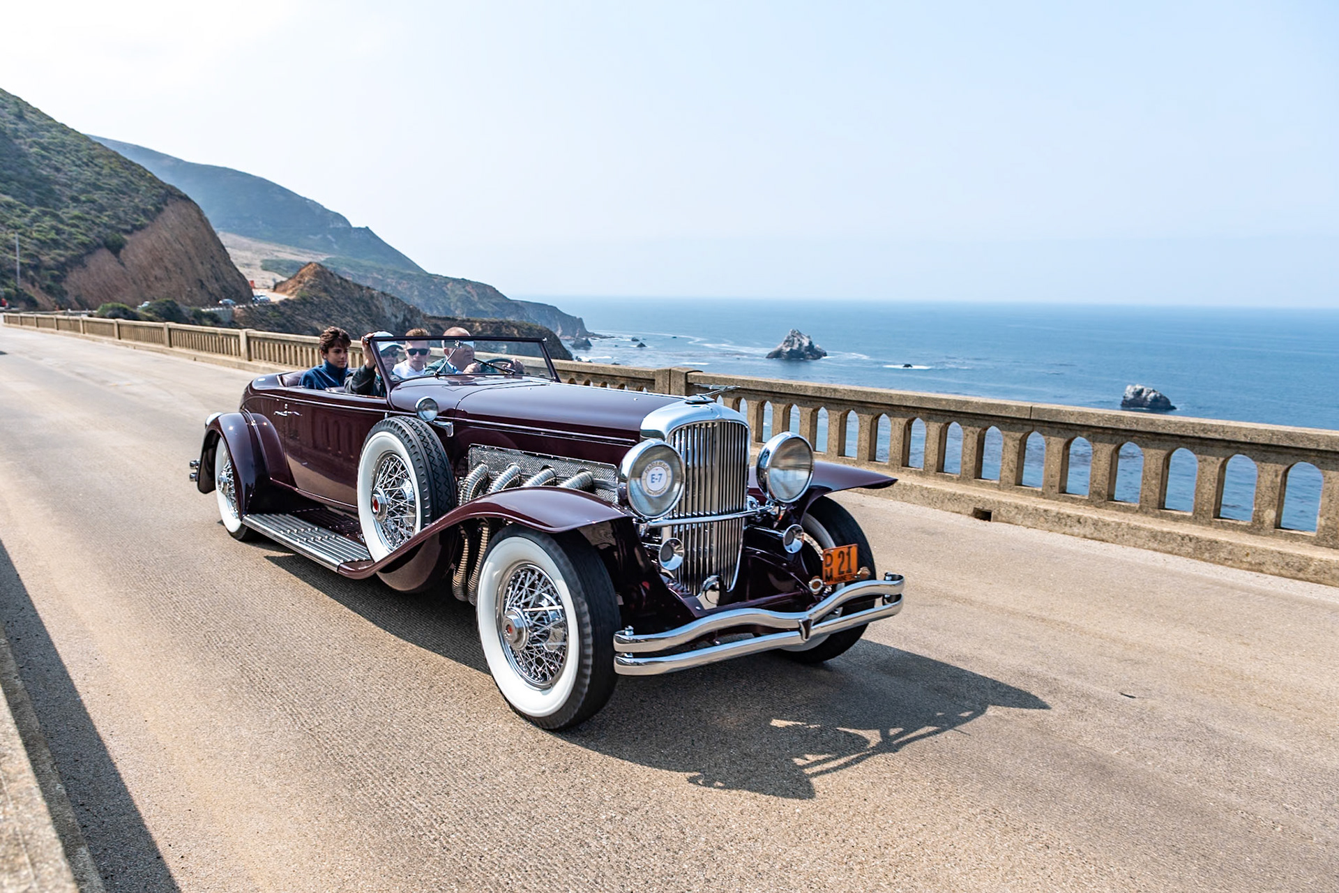 The Duesenberg SJ, introduced in 1932, had a supercharged, dual overhead cam, 8-cylinder, 320 hp Lycoming engine and was one of the most powerful motorcars in the world, capable of a top speed approaching 140 mph. That engine, combined with this Rollston Torpedo Convertible Victoria coachwork, makes this Model SJ (J-517), finished in November 1933, one of the most stunning Duesenbergs ever created. It was purchased new by Miss Margaret Flick, later to become Mrs. Margaret Hoffman of New York City. It was later acquired by Vernon Jarvis in 1955, who lent his entire car collection to the Early American Museum in Silver Springs, Florida. The Bahre Collection purchased it in 1986 and restored to its original Roosevelt Maroon paint scheme with black top, which it still wears today.