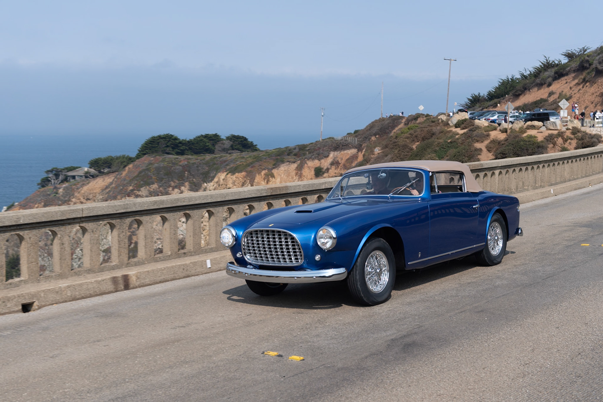 This Ferrari 342 America (chassis 0232AL) was the first of three cabriolets powered by a Lampredi-designed 4-liter, V12 engine, and it is the only 342 America bodied by Carrozeria Vignale. In total six Ferrari 342 Americas were built, and all were given an even chassis number, normally reserved for Ferrari competition cars. All the numbers ended in AL for the longer “America Lungo” chassis. The body was designed by Giovanni Michelotti, and although it shares many elements with other Vignale-built cars of the era, this car has several unique features, including the slotted taillights that are recessed into the fenders. After driving a 340 America in the 1951 Mille Miglia, amateur Swiss racer Otto Wild, a close friend of Enzo Ferrari, ordered this 342 America. The car was imported to the United States in the late 1950s and remained with the same owner in California for 34 years but was rarely seen in public. Having just been restored to its original specification by its current owner, this is the first time the car has been to Pebble Beach.
