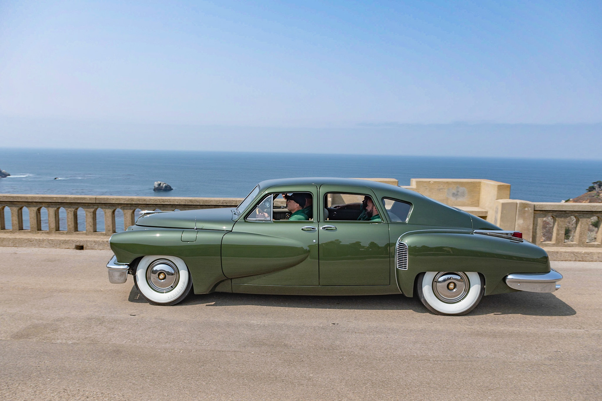 his car (chassis 1044) was the 44th of the 51 Tucker production cars built. After the Tucker factory closed at the end of October 1948, it was one of eight cars assembled by its designer, Alex Tremulis, and a handful of Tucker workers on their own time. Howard and Rosalind Kroplick purchased the automobile in January 2017, and since then, the Tucker has been driven fewer than 500 miles. The car is one of eight Tuckers originally finished in Andante Green with a green wool broadcloth interior.