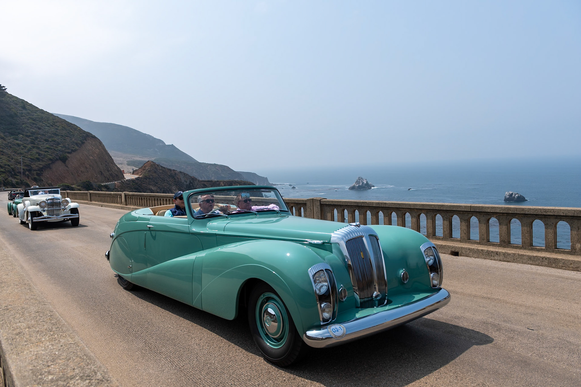 The Daimler DE36 was first made available to the public in 1946 and was offered in saloon, limousine and drophead coupé body styles. Daimler’s customers included the British royal family as well as the royalty of Afghanistan, Ethiopia, the Netherlands, Monaco, Saudi Arabia, and Thailand. A total of 205 DE36 chassis were built before production ended in 1953. This Daimler DE36 is the prototype and the first of seven similar cars with Hooper’s drophead coupé body, designed by Osmund F. Rivers. This drophead coupé was finished in a special jade green, and after the car was first shown at the 1948 London Motor Show, it was quickly nicknamed “the Green Goddess” by the motoring press. The car was often used by Daimler’s chairman, Sir Bernard Docker. While in Daimler’s ownership the car was continually modified and improved until, in 1953, the car was given a new Hooper-built body. The car remained in England until the end of the 1960s, when it was sold to an owner in the United States. The current owner bought the car in 2009.