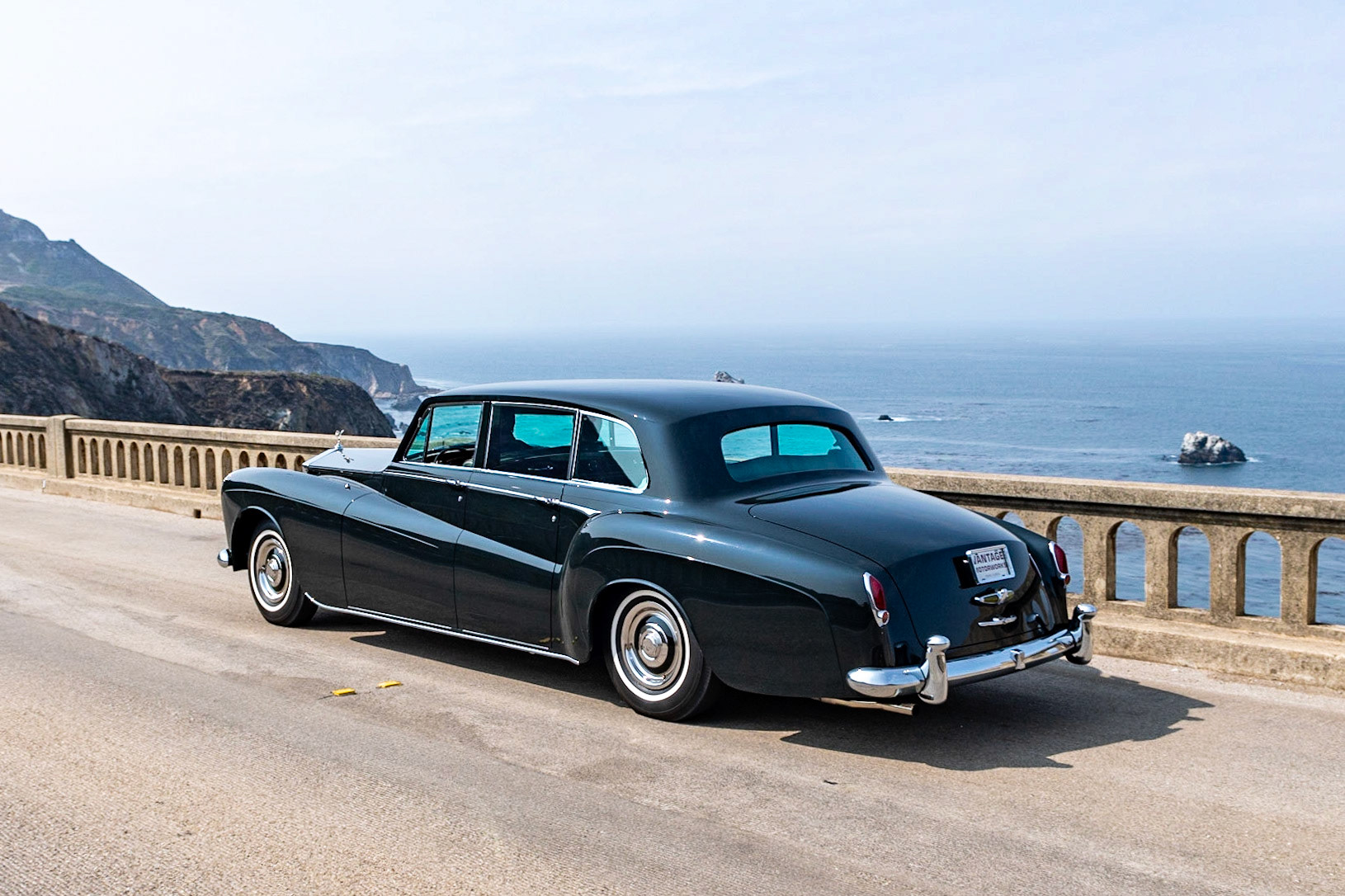 The new top-of-the-range Rolls-Royce Phantom V, introduced in autumn of 1959, replaced both the Phantom IV and the Silver Wraith. It had a new 6,230 cc all-alloy V8 engine that was also used in Silver Cloud II and Bentley S2 saloons, and it was built on a modified and strengthened Rolls-Royce Silver Cloud II 145-inch wheelbase chassis. With suitably luxurious coachwork, the finished cars measured well over 20 feet in length. Despite its size, the Phantom V was still quite capable of exceeding 100 mph. Many of the first orders came from the royal families of Europe and other dignitaries, but the bulk of inquiries came from industry or private individuals. Over the course of its 9-year production run, 516 Phantom Vs were sold, and most were built in England. This striking Limousine is an exception, boasting what is possibly Henri Chapron’s largest-ever body, designed for Mrs. K. Millbank of Paris. It first appeared at the 1961 Paris Auto Salon and has just been restored to its appearance there, with the deep green paintwork and pale green interior.
