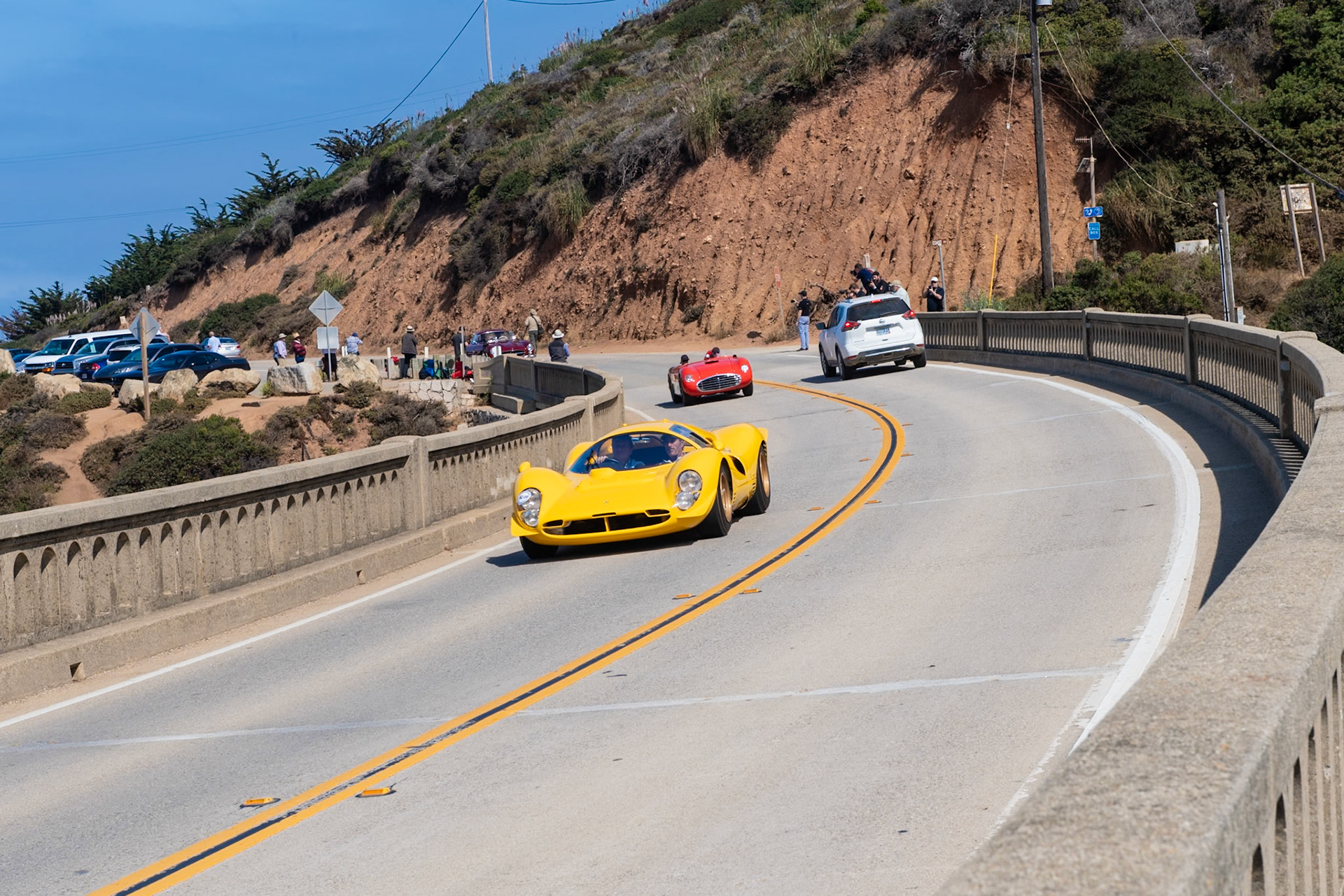 To replace the successful Ferrari P3, the factory developed the intermediate 412 P race car—also known as the P3/4. Designed by Mauro Forghieri, the 412 P features an aluminum body that owes its shape to the Ferrari wind tunnel, and the car develops 420 bhp due to its 4-liter, V12 engine with six Weber carburetors. This 412 P (chassis 0850) was purchased by the Ecurie Nationale Belge team of Jacques Swaters, and it raced in bright yellow livery at various events in 1967 and 1968. It finished second overall at the 1,000 km Race at Montlhéry in 1967 and it won the Cote de Condroz and Cote de la Roche Hill Climbs in 1968. The car was also entered in the 1967 24 Hours of Daytona when Ferraris famously finished 1-2-3. After its racing days concluded at the end of 1968, the 412 P was converted to street use for Dean Martin Jr. and was often seen on roads around Hollywood. It is shown here at Pebble Beach for the first time since being restored to its original racing specification.