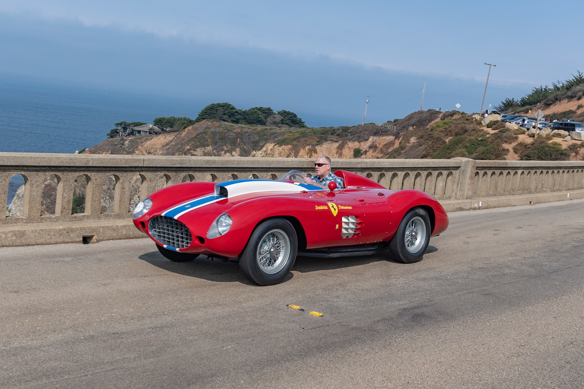 The Ferrari 410 Sport CM was developed from the Le Mans–winning Ferrari 375 Plus primarily for the Carrera Panamericana (the CM stands for Carrera Messicana), but also with an eye toward the growing importance of the North American racing scene. The new Aurelio Lampredi–designed, 5.0-liter V12 engine was the most powerful yet to leave the Ferrari factory. This 410 Sport CM (Chassis 0592 CM) is one of three 410 Spyders built by Scaglietti. It was sold initially to American team owner, Tony Parravano, and it first raced at Palm Springs where, driven by Carroll Shelby, it finished in first place. In 1957, Parravano headed to Mexico with a number of his race cars, not to compete in the Carrera Panamericana but because he was being chased by the IRS for tax “complications.” After crossing the border he was never seen again—although his cars turned up three years later! In 1970, this car was acquired by Robert Dusek, who restored it to the way it was when last raced by Scuderia Parravano.